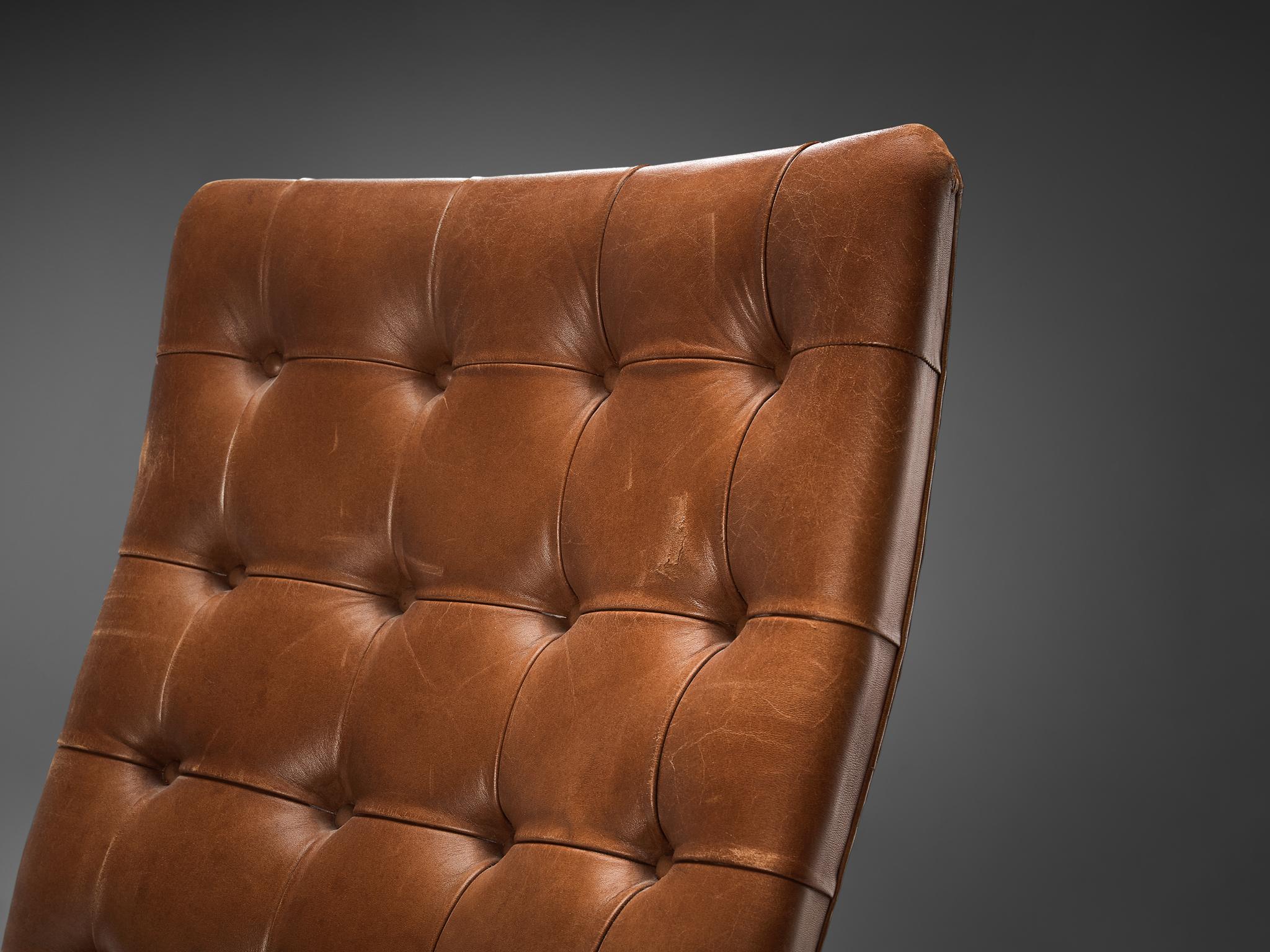 Mid-Century Modern Robert Haussmann & De Sede Ensemble de quatre fauteuils en cuir cognac en vente