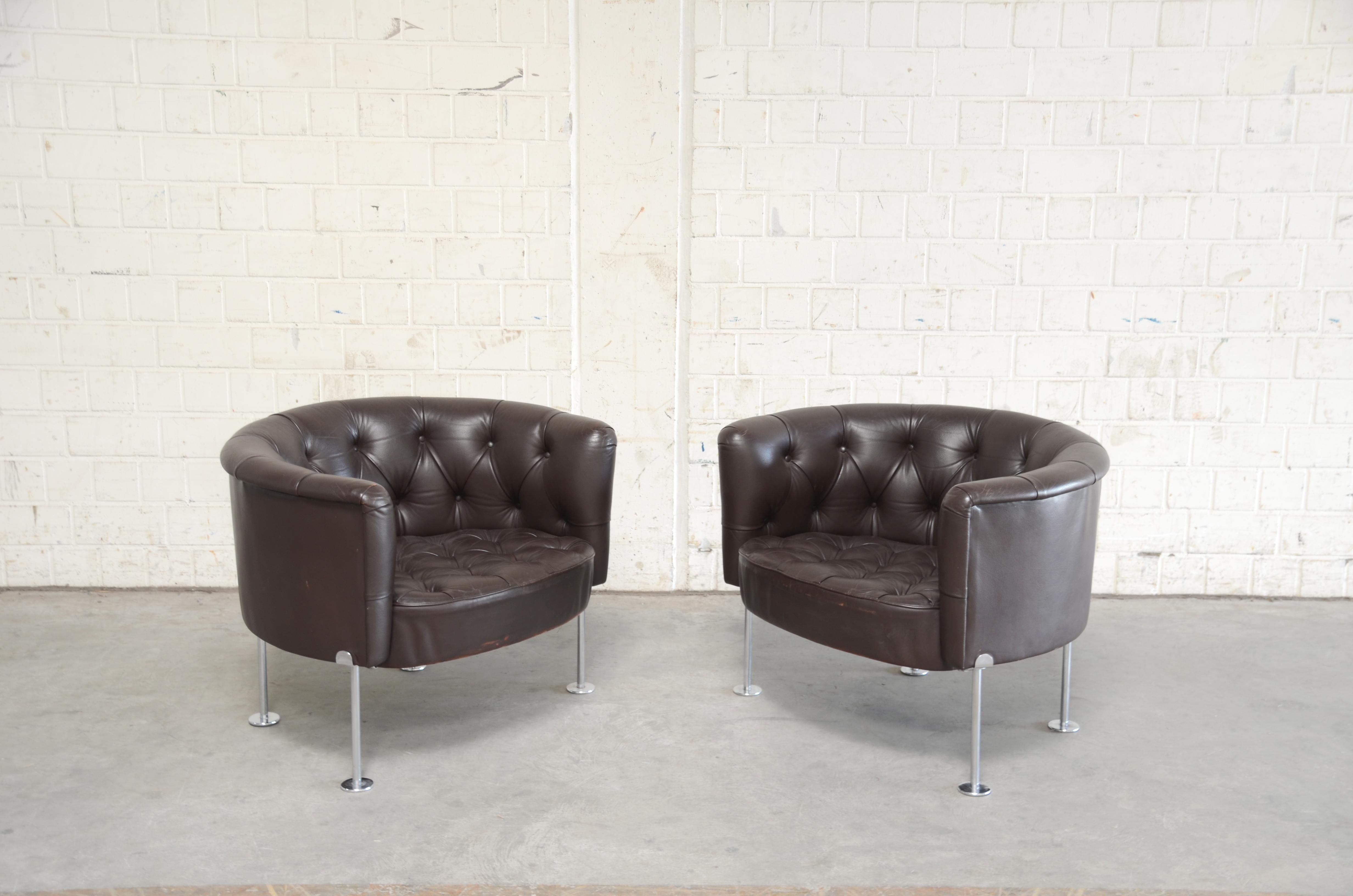 This model RH 310 leather armchair was designed by Robert Haussmann for Swiss design/ De Sede produced this design 1960-1964. Originally upholstered in red aniline leather, it was recolored long ago in brown by a leather workshop. Legs were