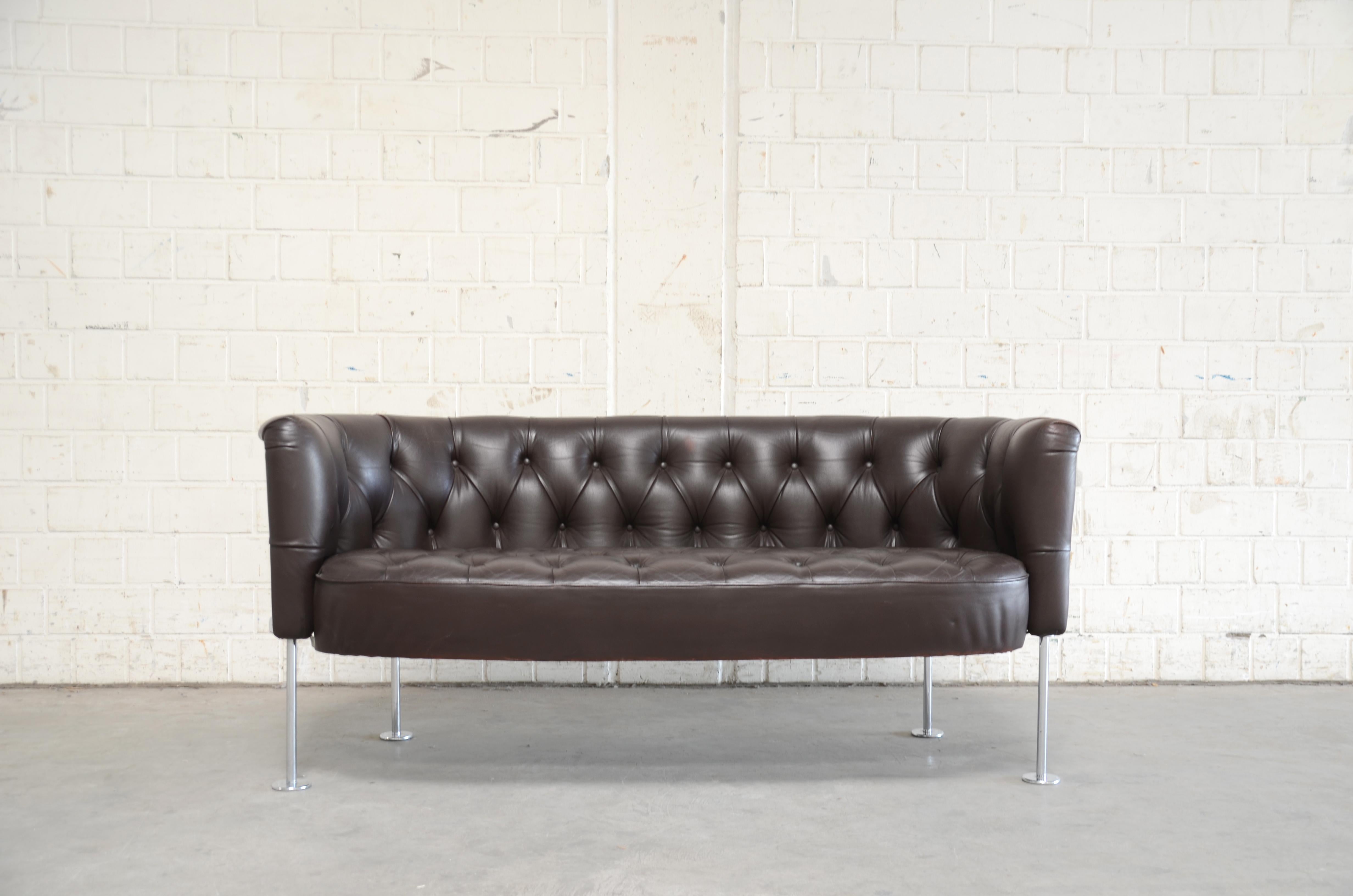 This model RH 310 leather sofa was designed by Robert Haussmann for Swiss Design/ De Sede produced this design 1960-1964. Originally upholstered in red aniline leather, it was recoloured long ago in brown by a leather workshop. Legs were chromed.
A