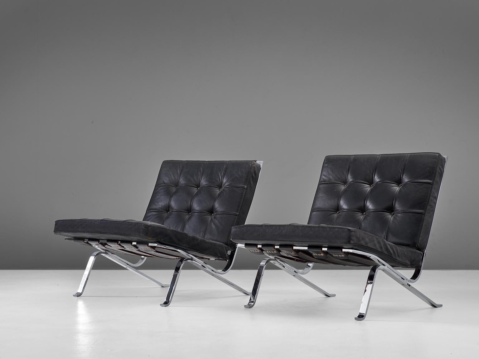 Robert Haussmann, set of two easy chairs model RH301, chromed metal and black leather, Switzerland 1950s. 

A pair of 2 rare and early chairs by Swiss born architect Robert Haussmann. This chair was an homage by Haussmann to his idol and iconic