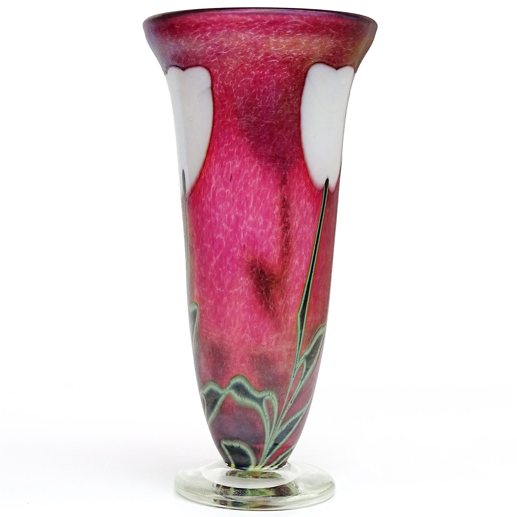 Beautiful vintage hand blown dark pink (almost red) iridescent surface, white tulip flowers, trumpet shaped vase. The vase is documented to designer, and Canadian artist Robert Held. It is signed 