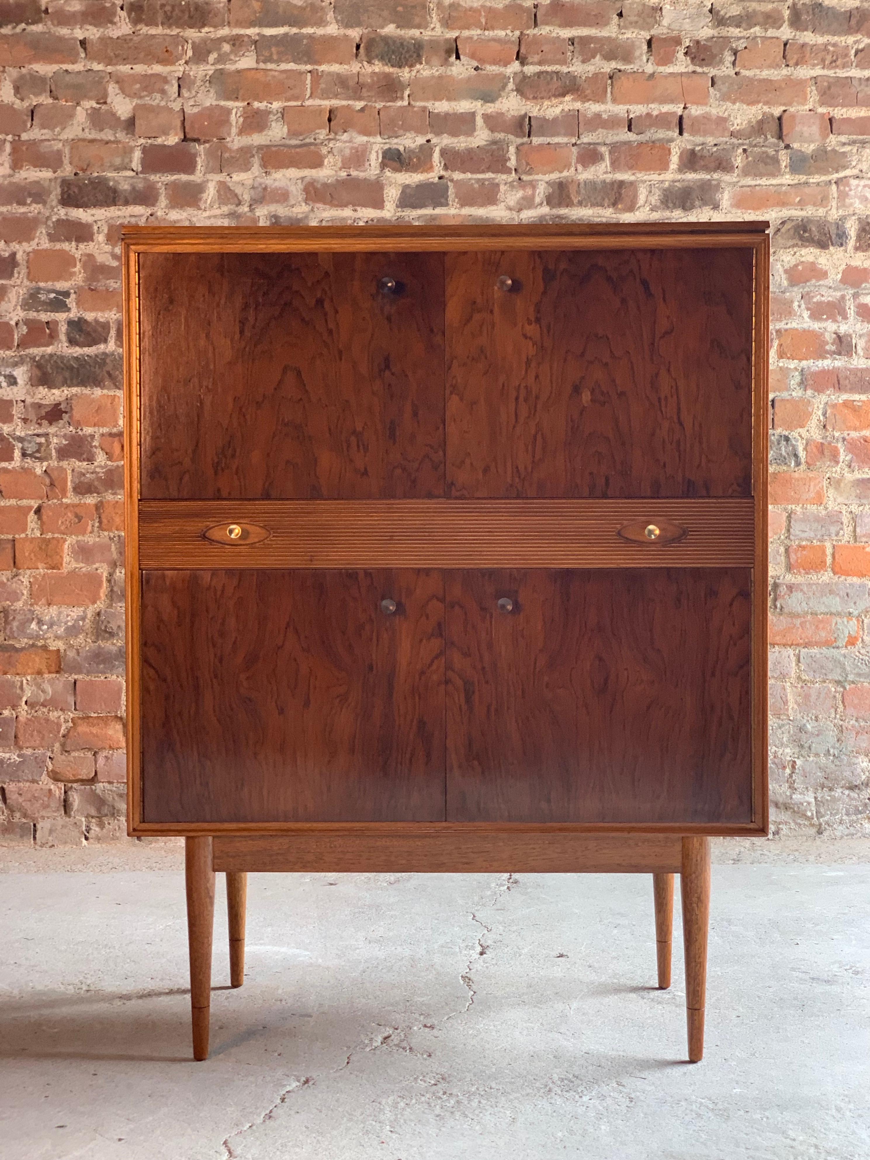 Robert Heritage for Archie Shine rosewood cocktail cabinet Hamilton Range 1960s

Midcentury Hamilton rosewood cocktail cabinet designed by Robert Heritage and manufactured by Archie Shine circa 1960, wonderfully styled and beautifully constructed