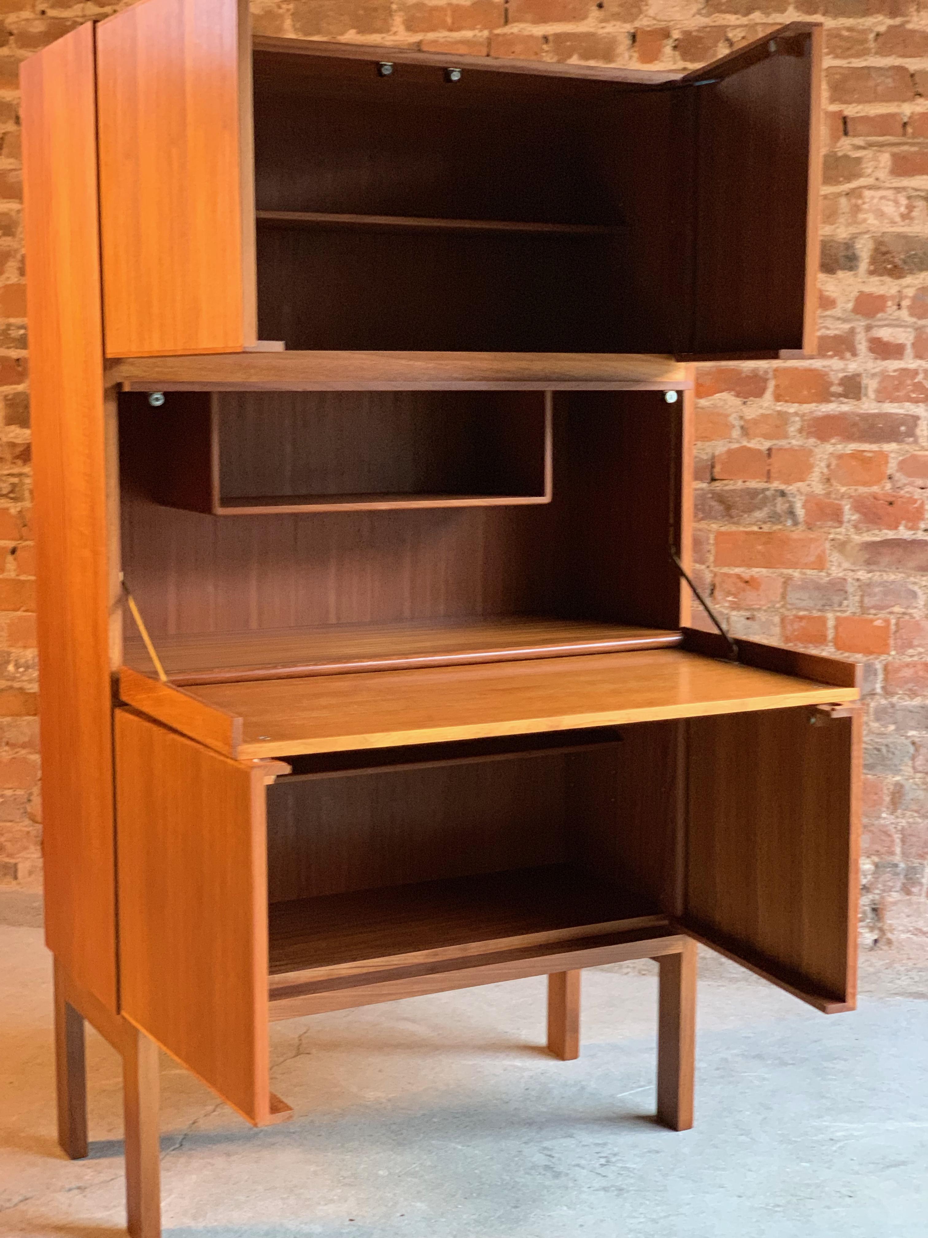 Rare Robert Heritage for Gordon Russell GR69 teak drinks cabinet, circa 1969

A fabulous and extremely rare design GR69 by Robert Heritage for Gordon Russell of Broadway, this solid teak cabinet was designed in 1969 as part of the GR69 range of