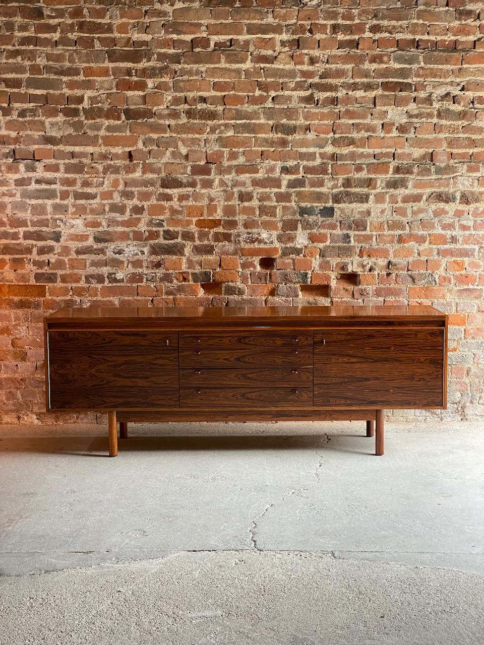 Robert Heritage Granville rosewood sideboard by Archie shine Circa 1969

Magnificent Robert Heritage Granville rosewood sideboard by Archie Shine circa 1969, this rare and highly sought after sideboard with its wonderful figured Brazilian rosewood