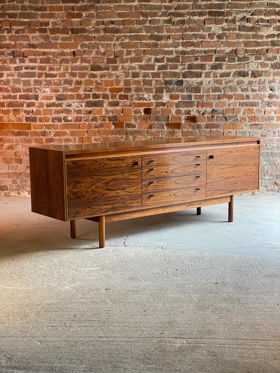 Robert Heritage Granville rosewood sideboard by Archie Shine Circa 1969

Magnificent Robert Heritage Granville Rosewood Sideboard by Archie Shine circa 1969, this rare and highly sought after sideboard with its wonderful figured Brazilian rosewood