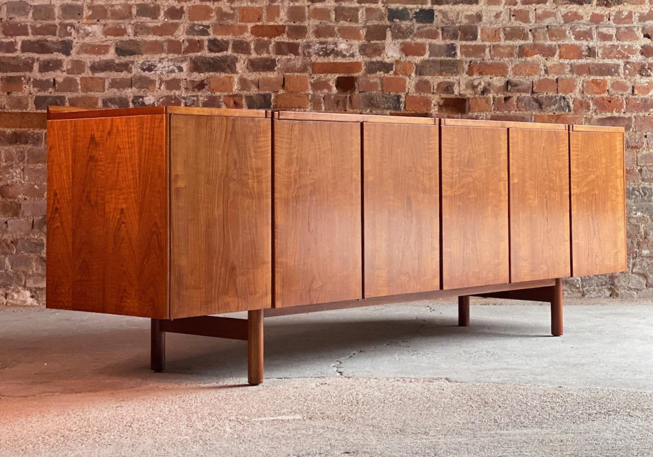Robert Heritage teak sideboard for Archie Shine, circa 1960

Magnificent midcentury design Robert Heritage for Archie Shine long six door teak sideboard designed by 1960s, the long rectangular top over six cupboard doors with three internal