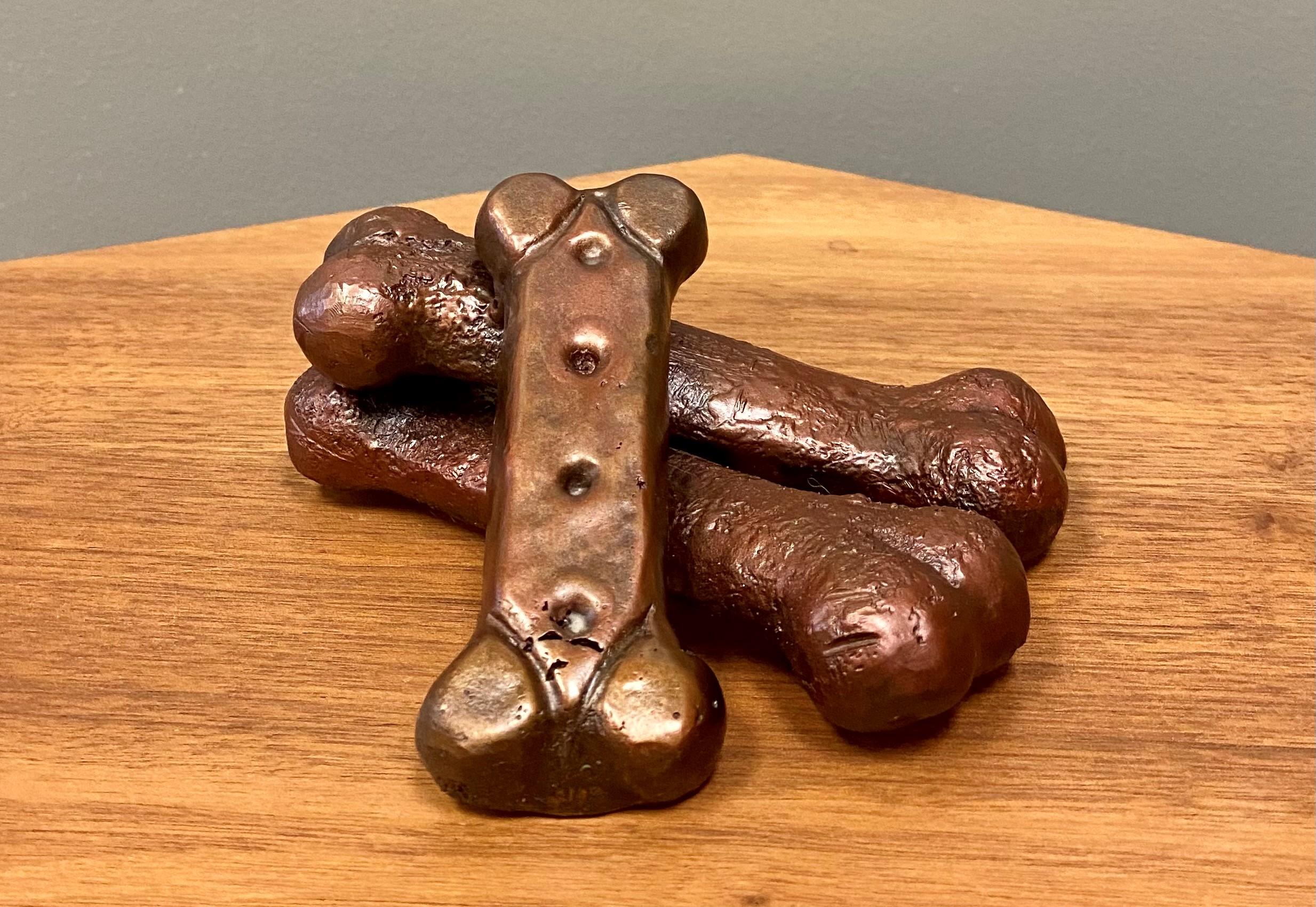 Robert Holmes Figurative Sculpture - Dog Biscuit Pile, Large