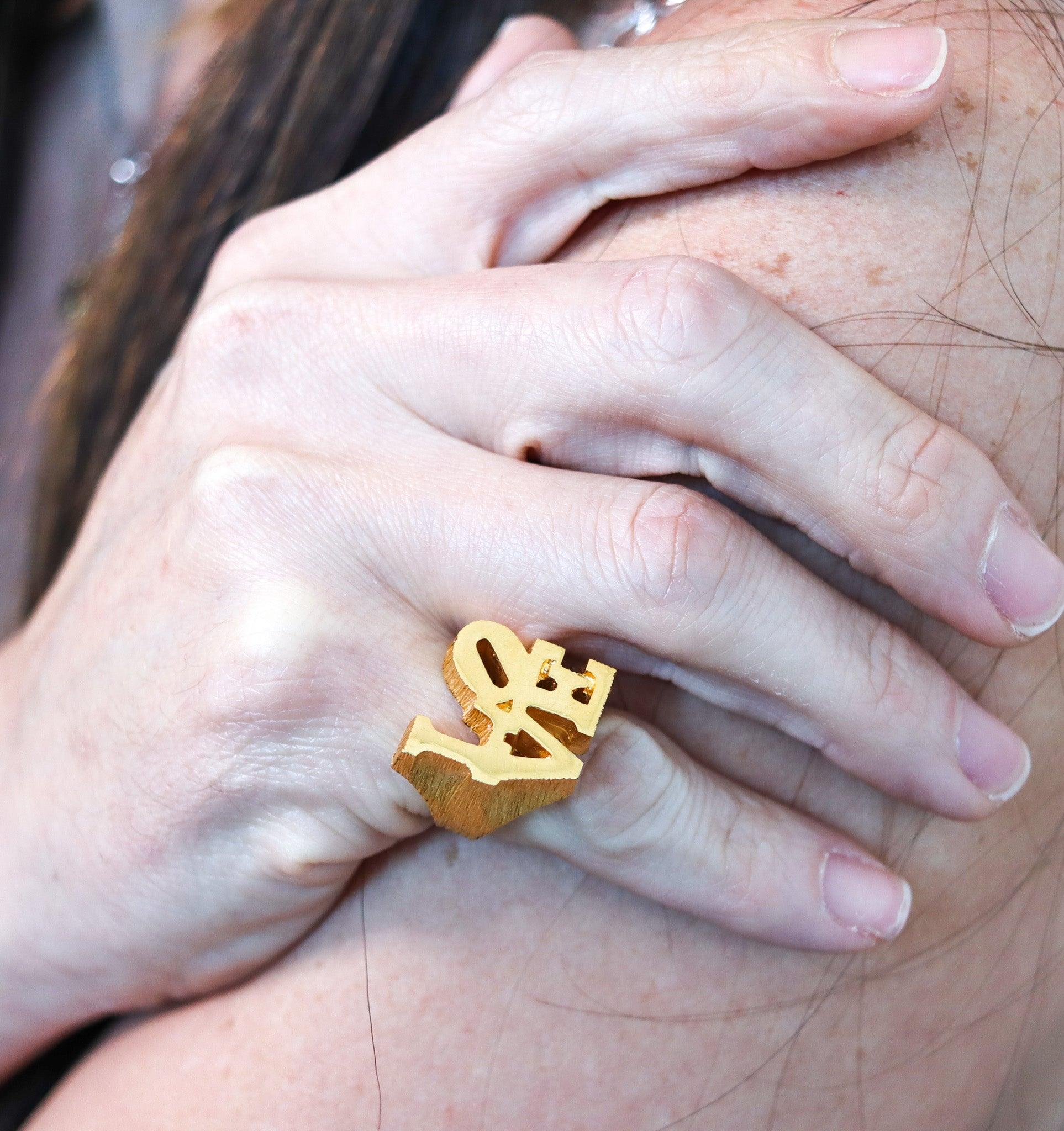 Sculptural Love ring designed by Robert Indiana (1928 - 2018).

This is an iconic, wearable art and powerfully symbolic sculptural LOVE ring, created by Robert Indiana, back in the 1960's Robert Indiana was one of the most recognized American