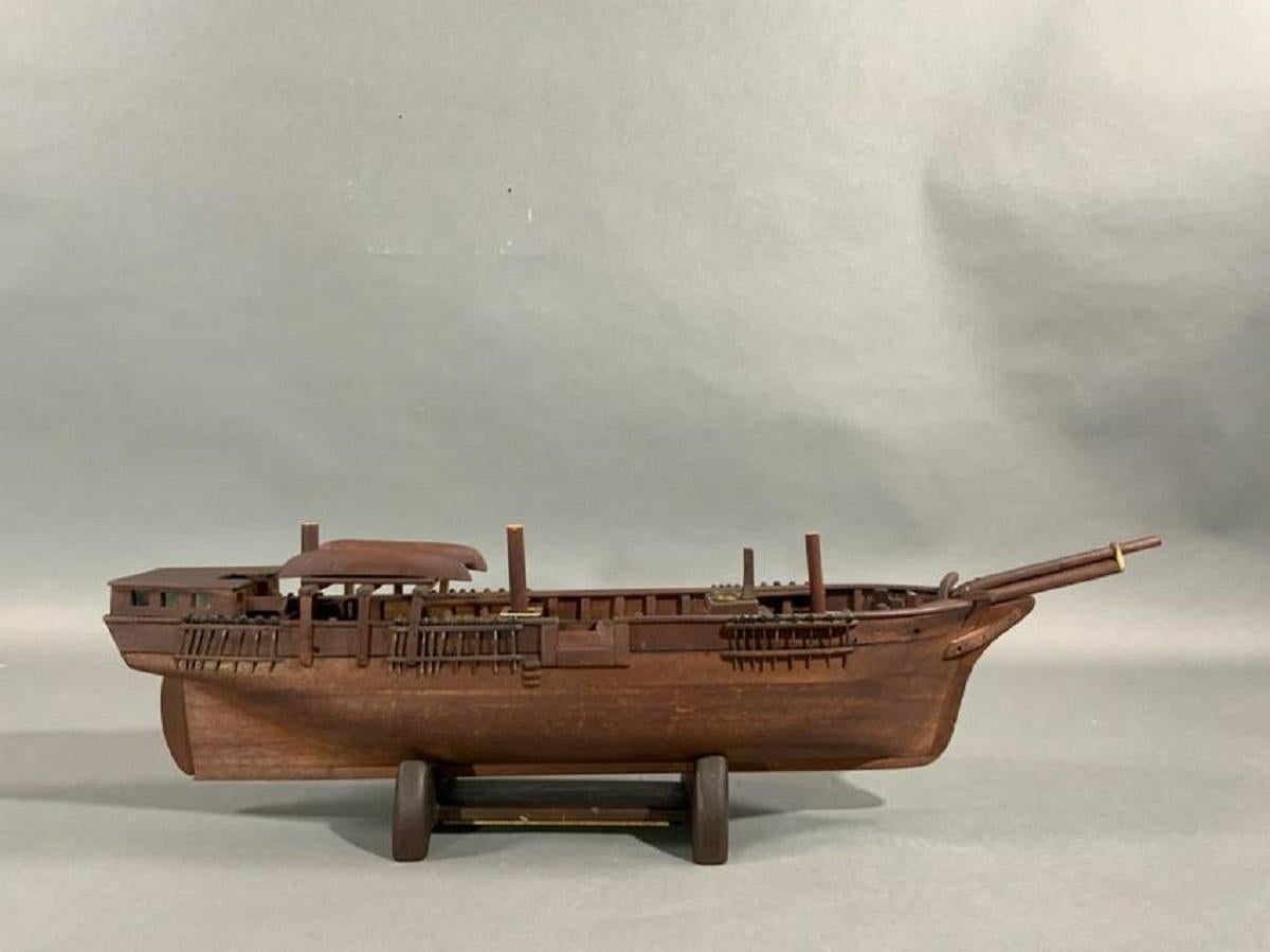 Hull model of an American Whaleship built by the ship model master Robert Innis. Showing the Innis style this model has built up bulwarks, great windlass, tryworks with cauldrons and chimney inverted whaleboats etc. Many rows of deadeyes.

Model