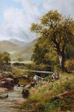 19th Century landscape oil painting of figures picking flowers at a river bank