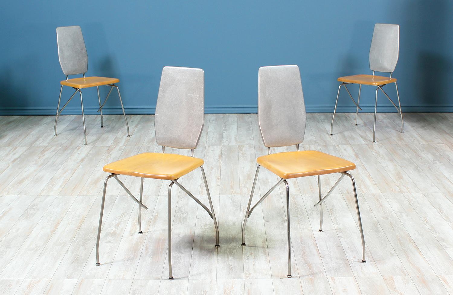 Splendid set of four dining chairs designed by Robert Josten and manufactured by Robert Josten and Associates in the United States circa 1970’s. Each of these chairs feature the original cast aluminum bases that are perfectly complimented with the