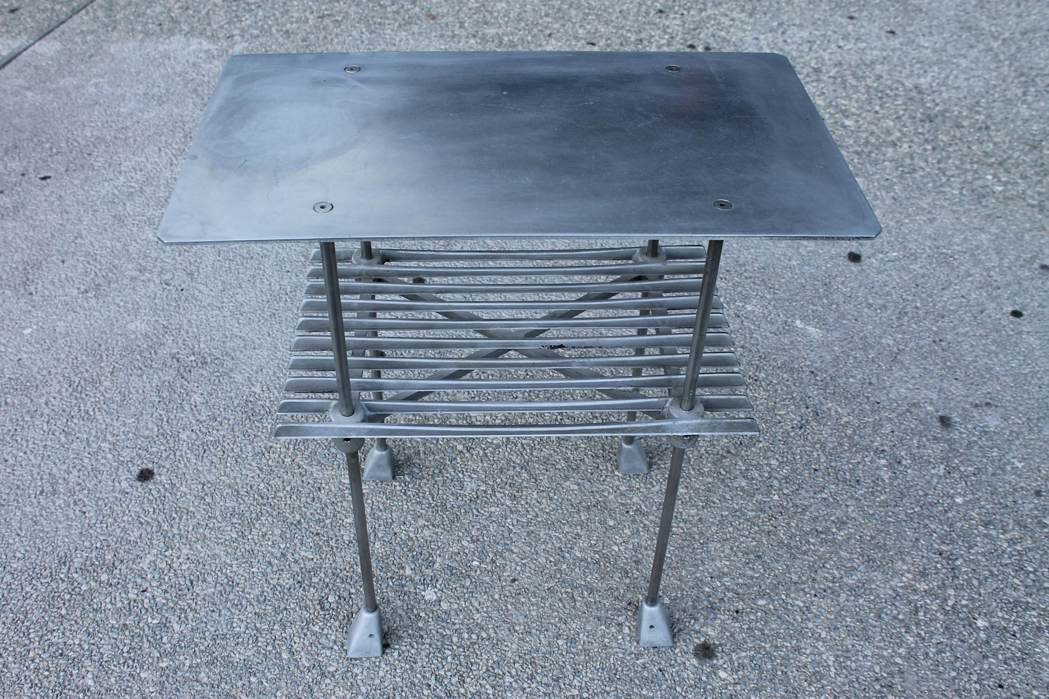 Rare aluminum side table by Robert Josten. Table measures 24