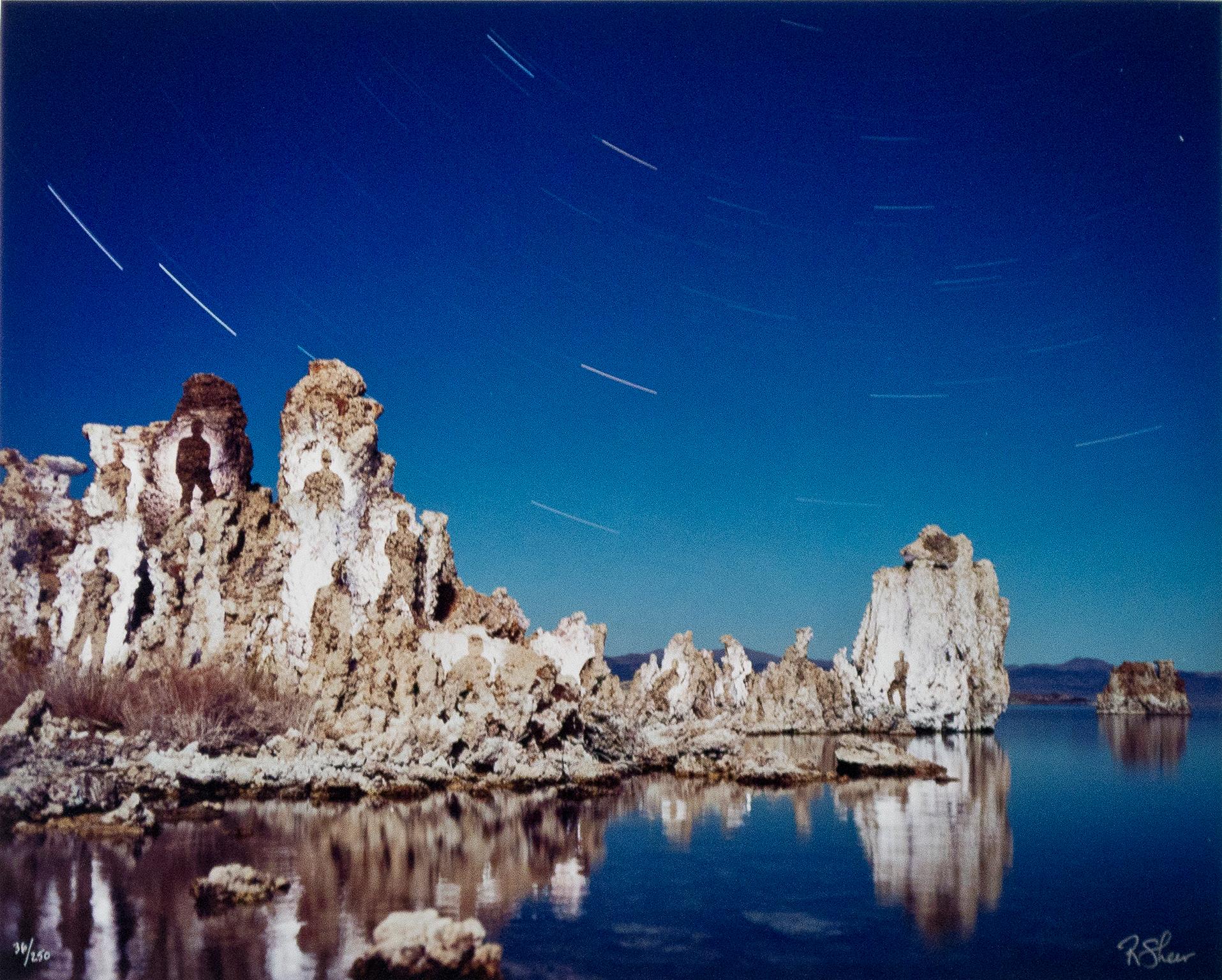 "Mono Lake, Spirit Shadows No. 1," is an original fine-art performance photograph by Robert Kawika Sheer. The artist signed this piece in the lower right and editioned it in the lower left. Edition 36/250. The image depicts the limestone rock