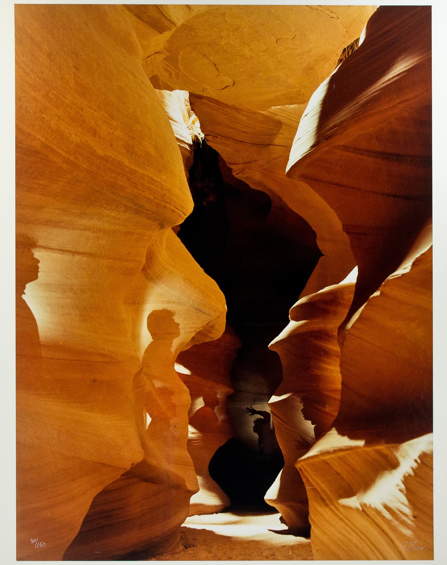 "Spirits in Corkscrew Canyon" is an original fine-art photograph by Robert Kawika Sheer. This piece is signed in the lower right and editioned in the lower left. Edition 30/150. Sheer depicts the aptly-named corkscrew canyon with twisting golden and