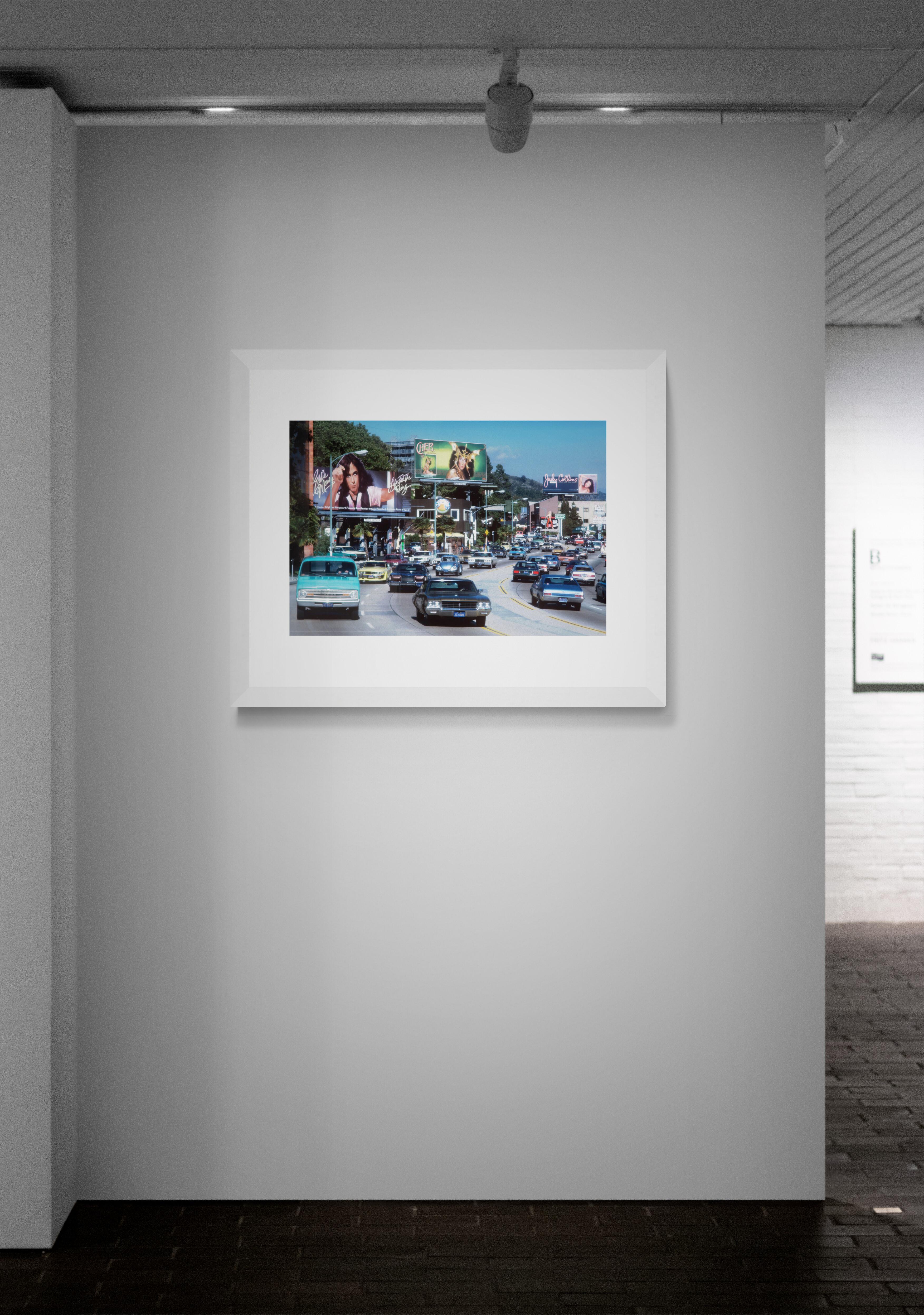 Robert Landau's urban landscape: Sunset Strip with Three Billboards; featuring Eddie Money, Cher, and Judy Collins and an unforgettable view of Sunset Boulevard in 1979.

Archival pigment print from an edition of 15, printed on 100% cotton fine art
