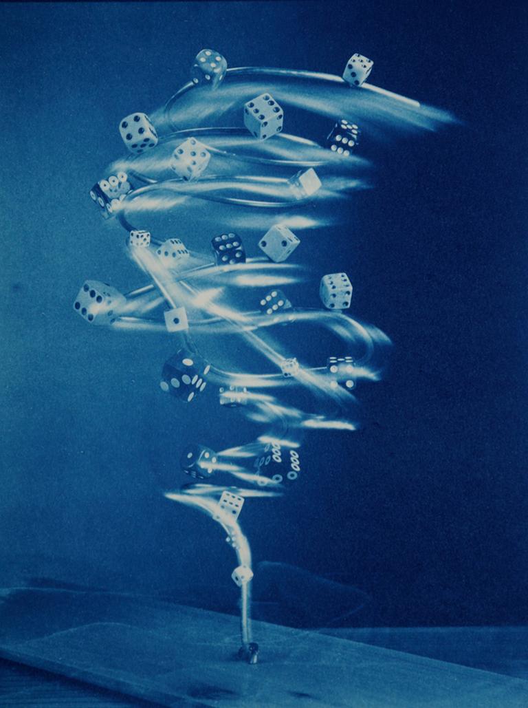 Robert Langham Still-Life Photograph - Dicenado - Surreal blue cyanotype of dice tornado, kinetic still life abstract