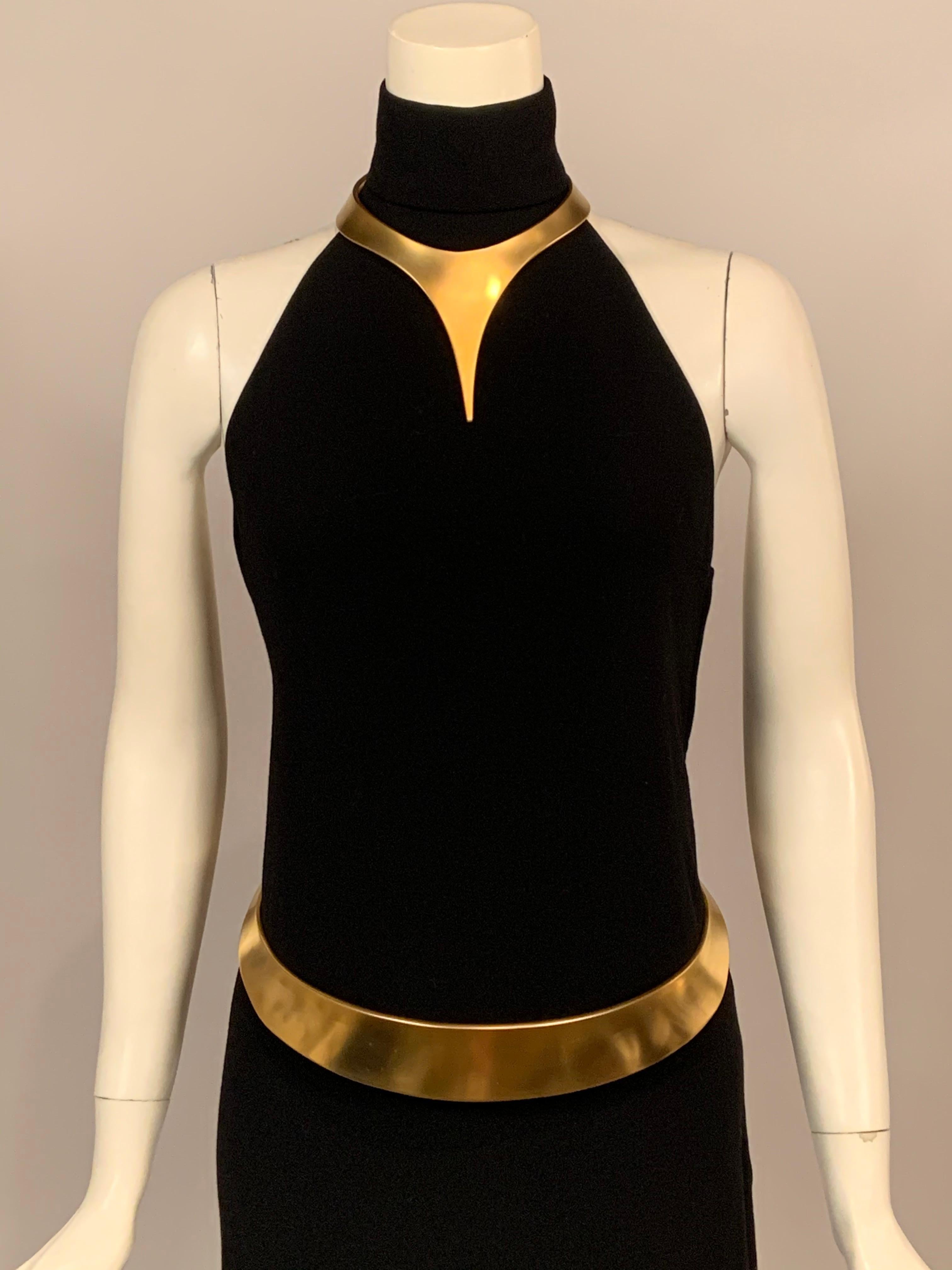 An early and dramatic Robert Lee Morris design for Donna Karan, this striking matte gold collar and belt set is emblematic of their design collaboration. The elegance and simplicity of the modern design work perfectly with the matte gold finish.