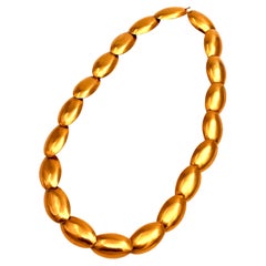 Vergoldeter Eiergürtel/Halskette von Robert Lee Morris