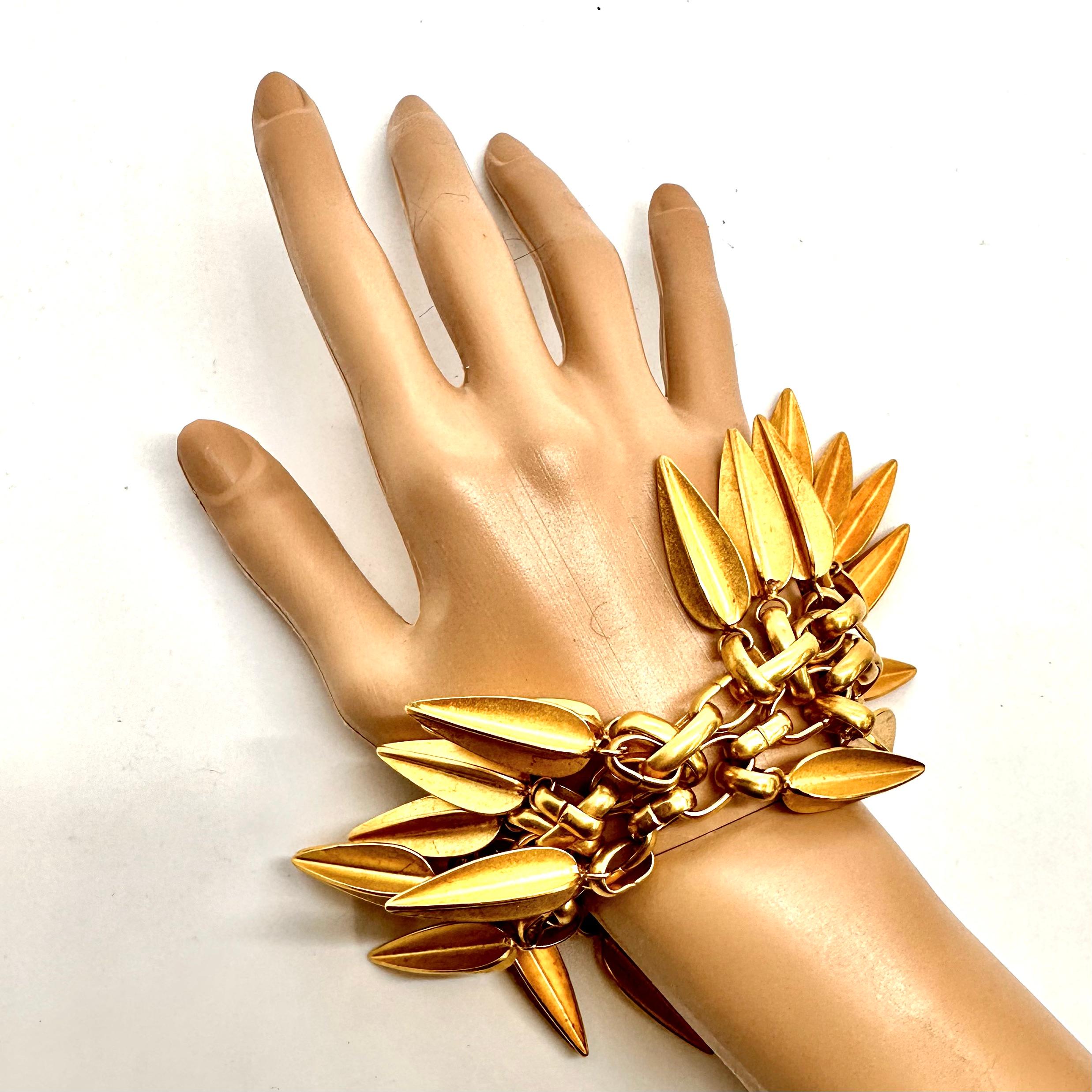 Robert Lee Morris Gold Dart Fringe Charm Bracelet In Good Condition For Sale In New York, NY