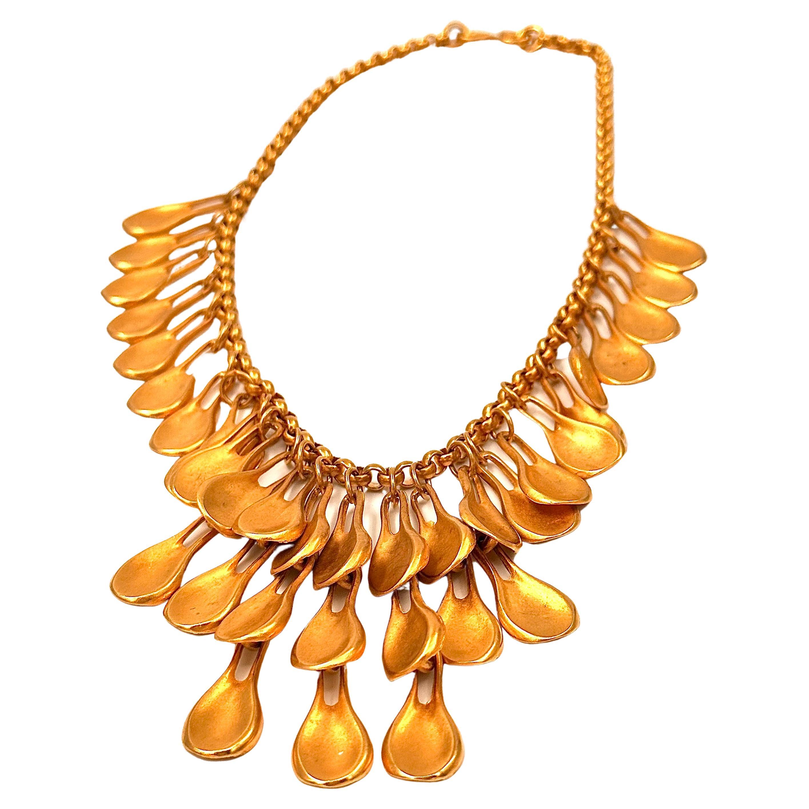 Robert Lee Morris Gold Plated Raindrop Bib Necklace 1989, an iconic Bold Gold necklace from the era of the 80's big jewelry trend. Even though this is not a big huge necklace like many that were runway pieces in the 80's, this is a pared down