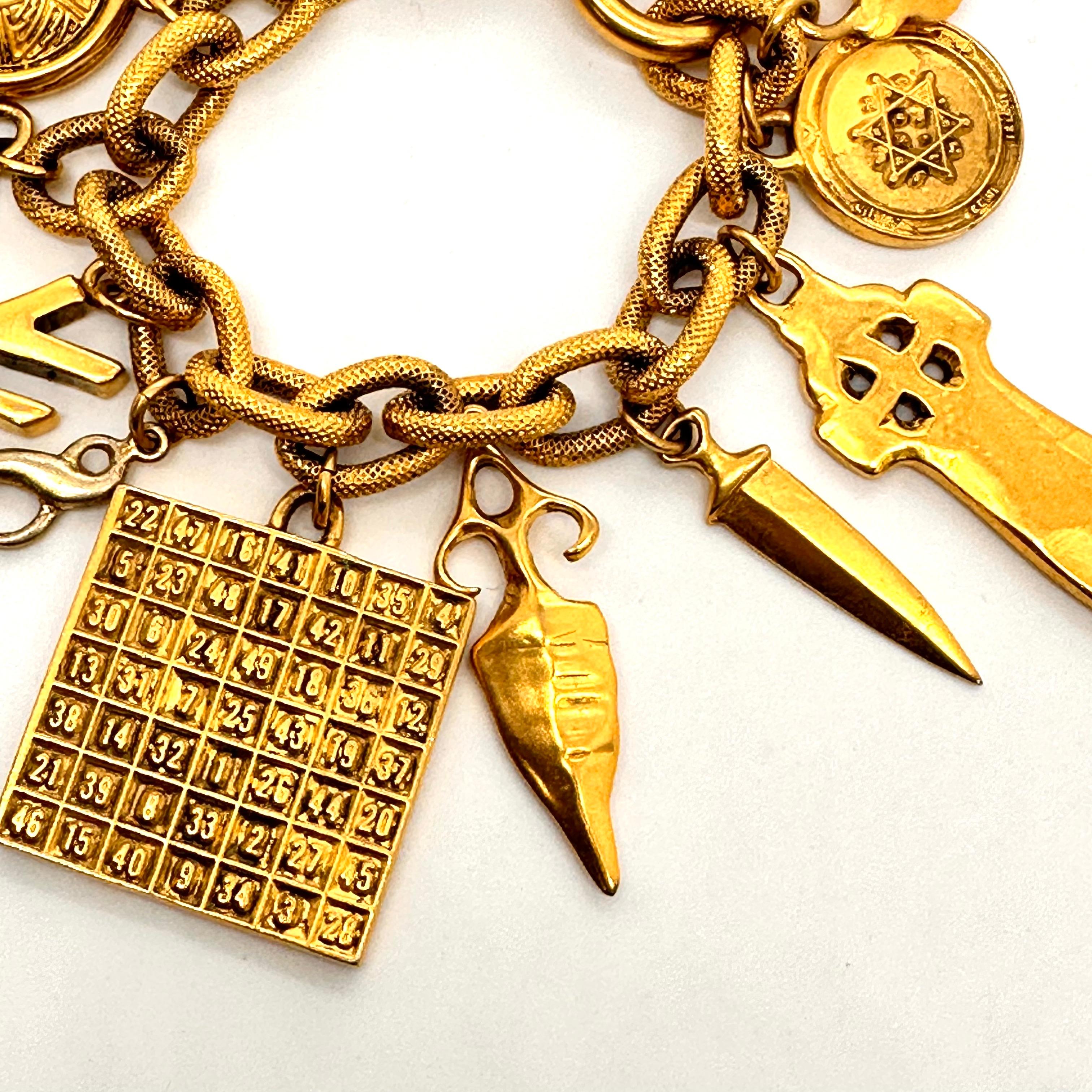 Occult symbols from ancient books of magic were the inspiration behind this fabulous Robert Lee Morris charm bracelet. Robert Lee Morris created this mysterious and fun piece during the early 1990's after a visit to Ireland and the Hebrides Islands