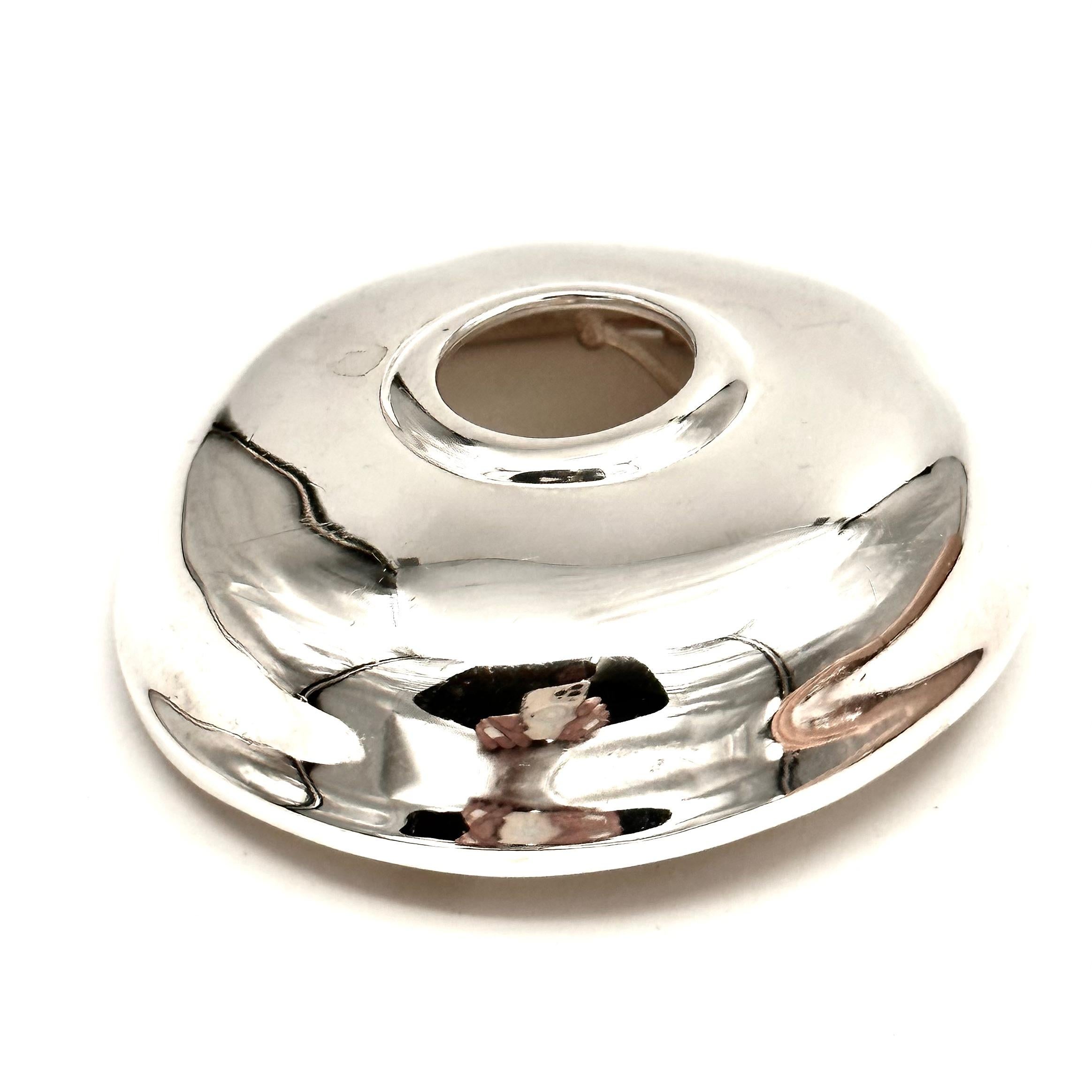 This bold and very sculptural brooch by robert Lee Morris is sterling silver, and is an actual dome that is nearly 3/4