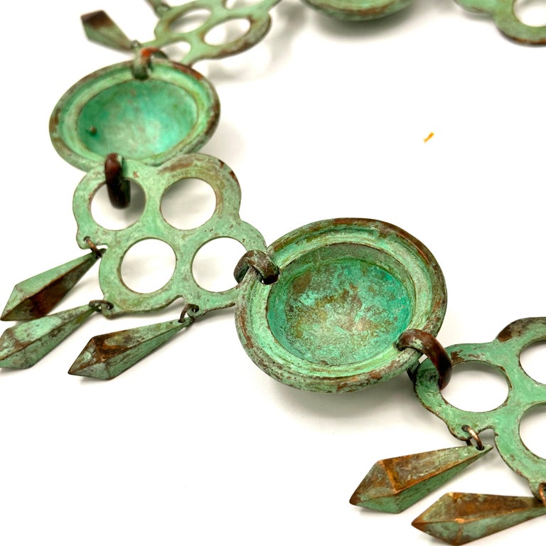 Verdigris chain belt store