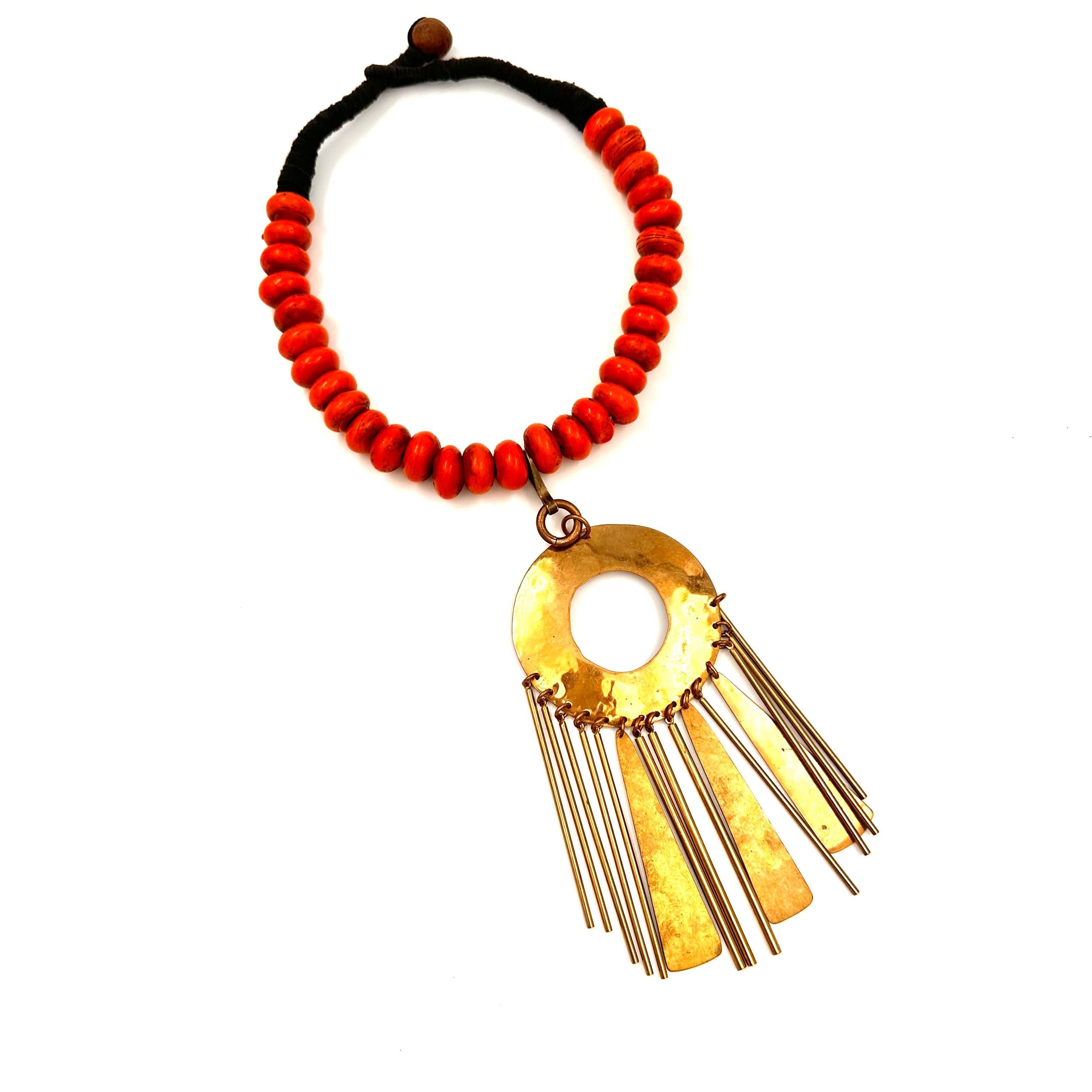 Robert Lee Morris Wabi Sabi Red African Bead Necklace With Fringed Pendant, a one of a kind neckpiece created in 2009 as part of the growing Tribal collections in the archive library. Wonderful to mix this colorful necklace with a variety of other