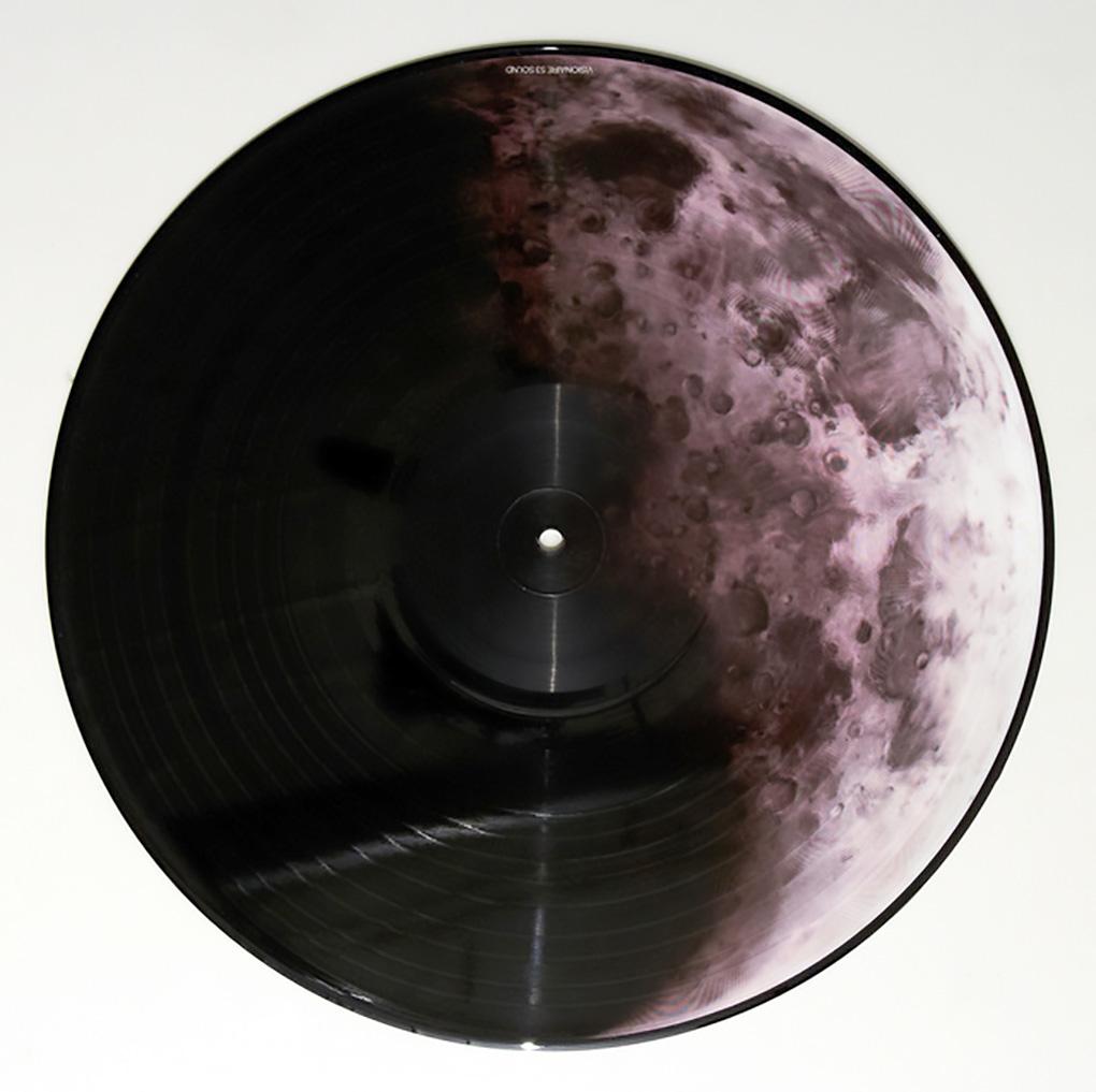 Robert Longo (untitled) Moon In Shadow record art:

Off-set print on vinyl record. 2007.
12 inches in diameter. 
Excellent Condition.
Unsigned from an edition of 5000.
Reverse side illustration by Raymond Pettibon (see last image).
Published by