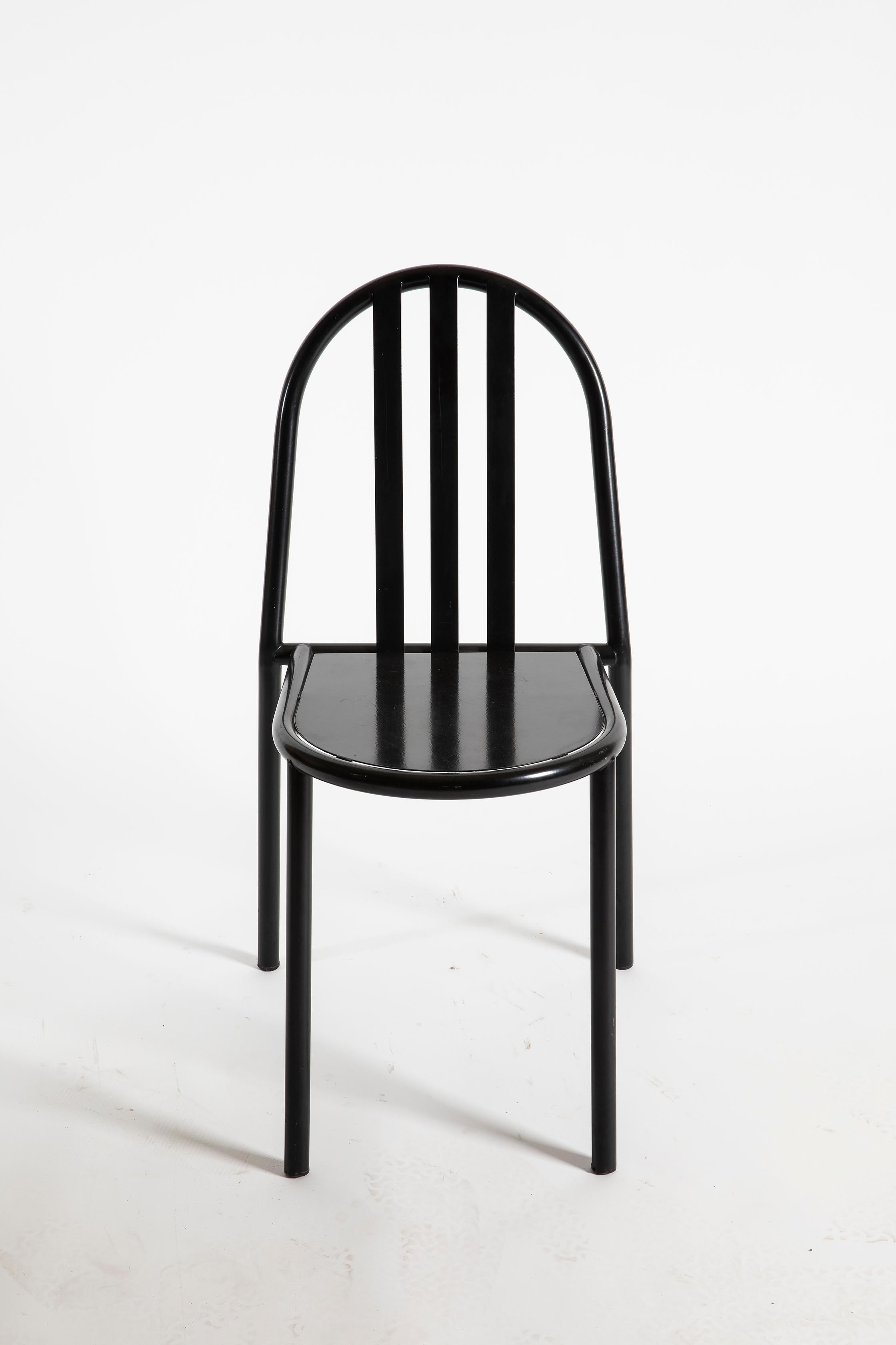 Dining chairs by Robert Mallet-Stevens. Essential design from 1930s with structure in black lacquered steel tube. Stackable. This set is a re-edition from the famous Italian factory Pallucco in 1980s.
Twelve chairs available.

Bibliography
Pallucco