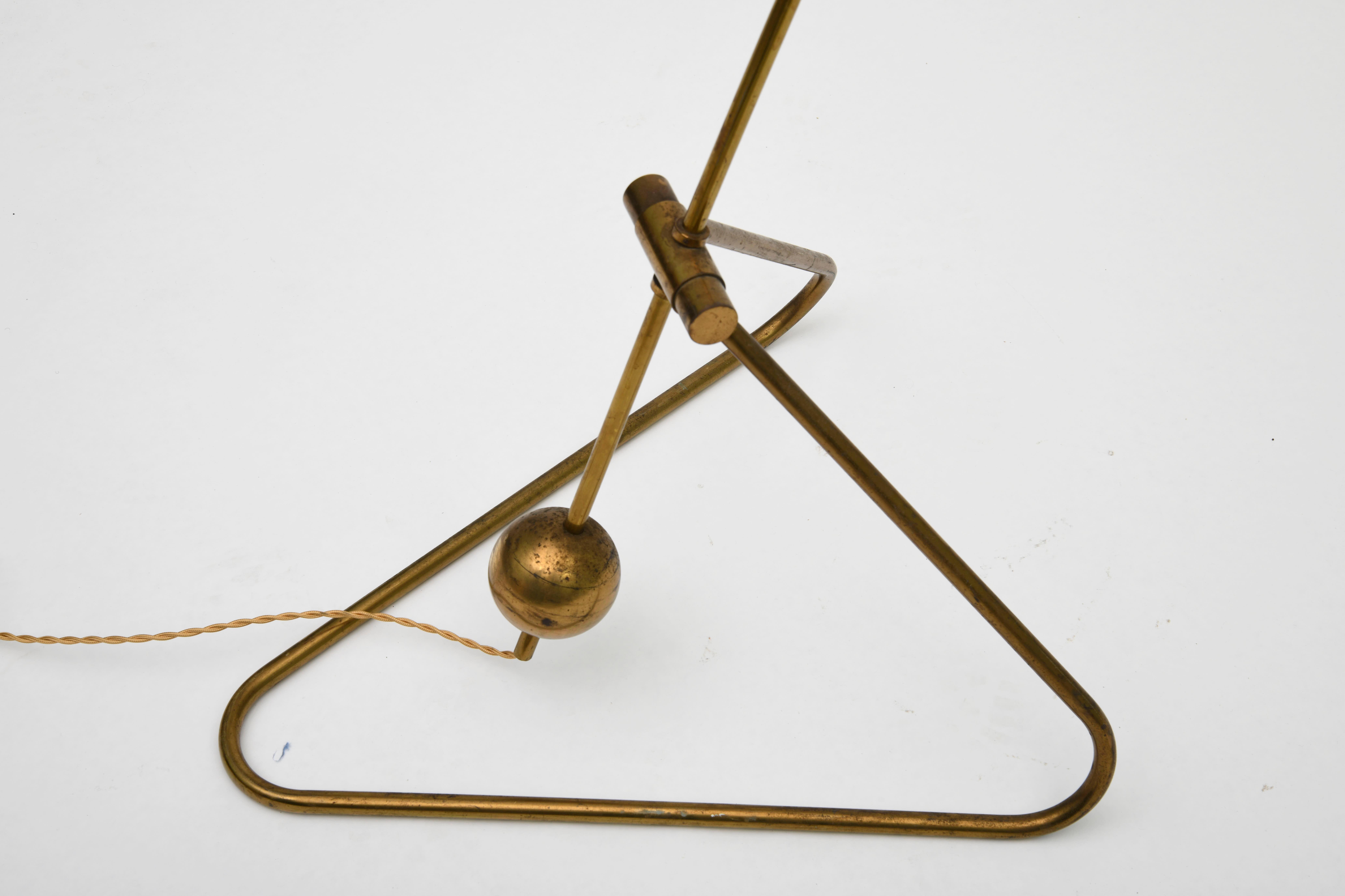 Robert Mathieu
Floor lamp, circa 1950
Brass
Measures: 83 H x 19 W x 17 D inches
210.8 H x 48.3 W x 43.2 D cm
Base: 20 x 17 inches / 50.8 x 43.2 cm

The base and shades of the lamp swivel in order to direct the light. Very good vintage