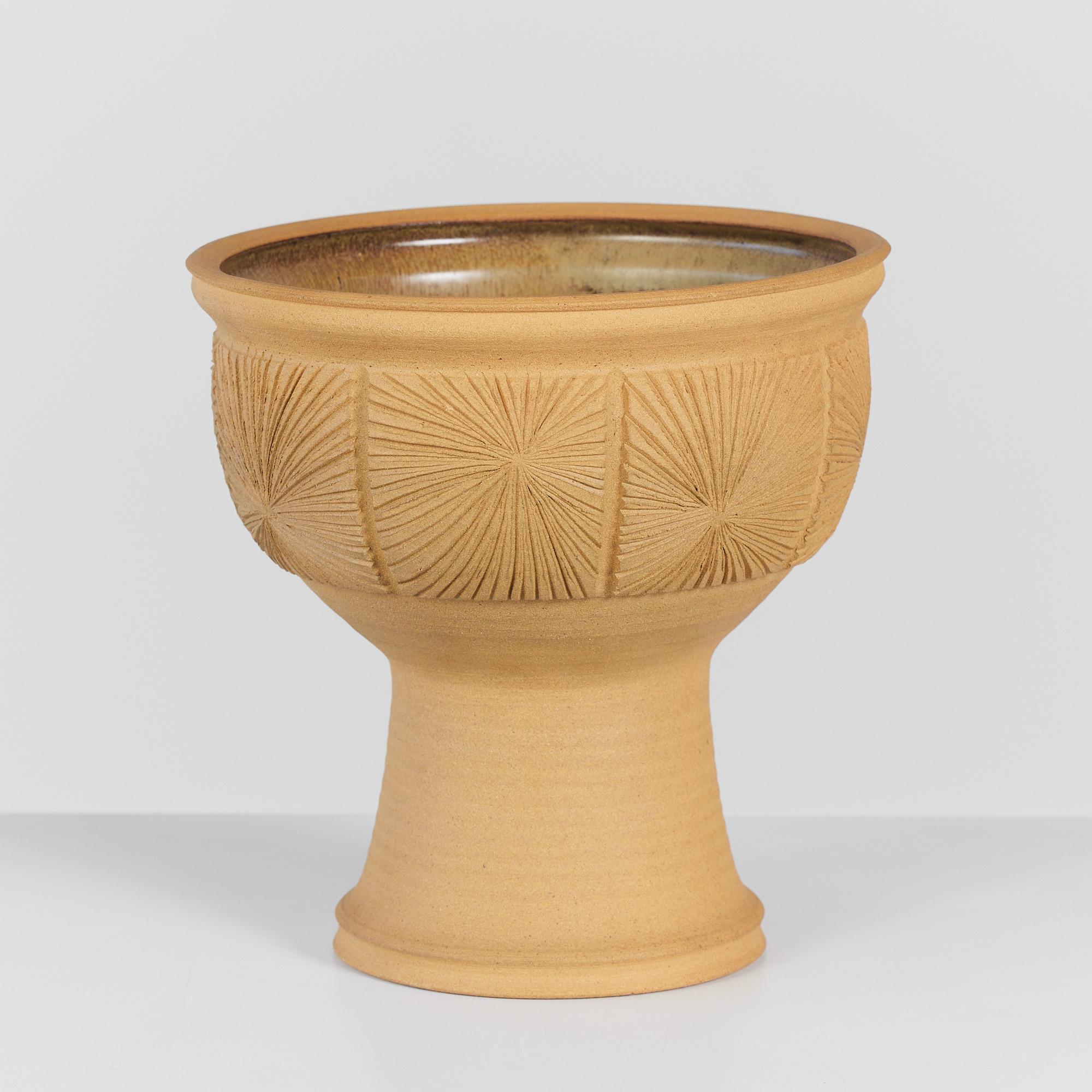 Hand thrown studio pottery planter by California ceramicist Robert Maxwell, c.2004. The chalice shape is incised with Maxwell's signature sunburst design. The interior of the planter is glazed.

Signed by artist on the underside - Robert Maxwell