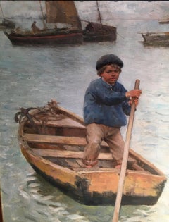Young Scottish/English Boy paddling his boat