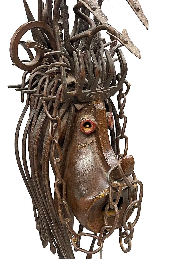 Robert Michiels (1933), iron sculpture

An iron sculpture in the shape of an animal head raised on a round base, made by Robert Michiels, Belgium, signed. In 1966 Robert received the Jeune Sculpture Belgium prize, the following year the Hainaut