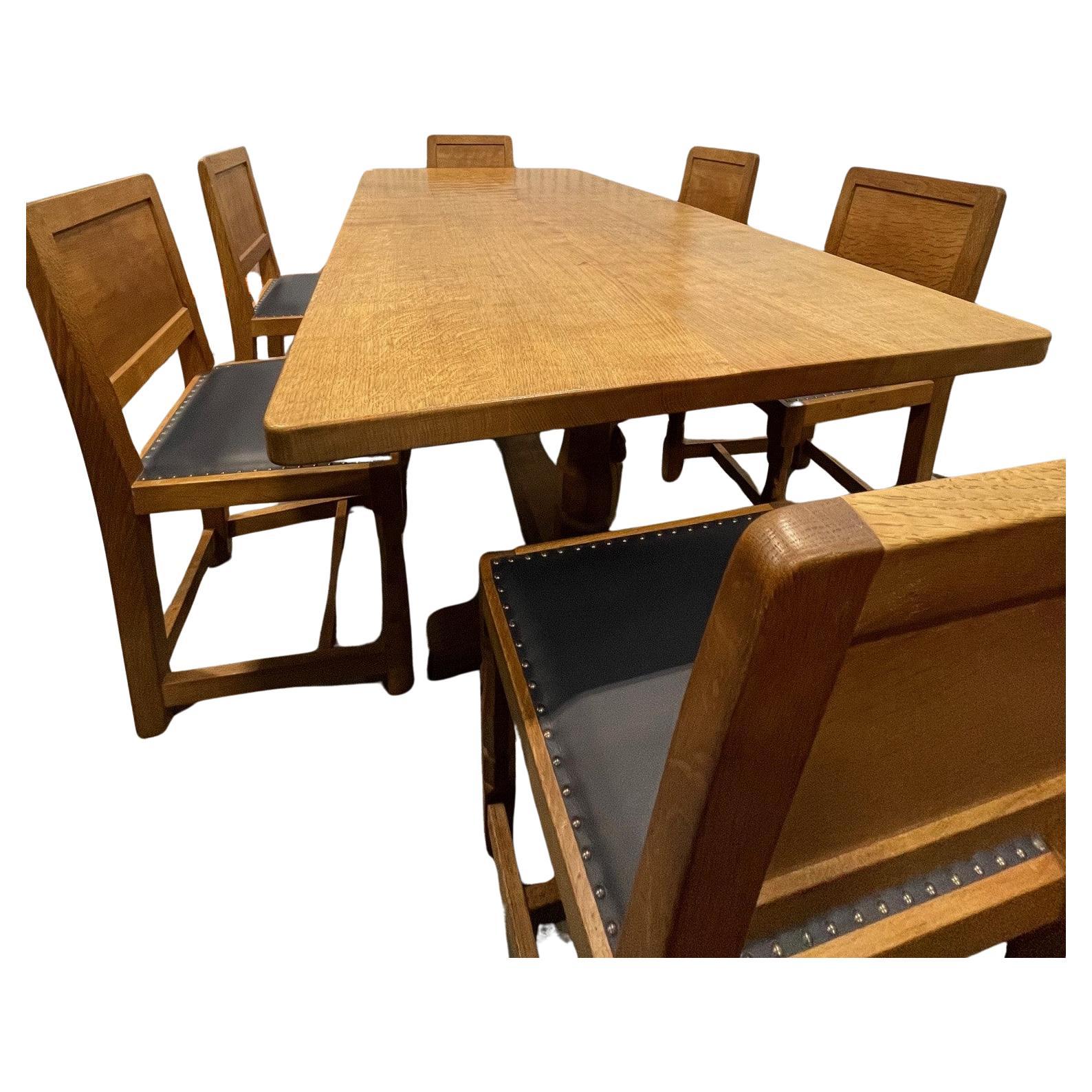 Robert Mouseman 6′ Dining Table and Set of 6 Leather Dining Chairs For Sale