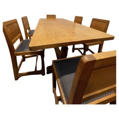 Robert Mouseman 6′ Dining Table and Set of 6 Leather Dining Chairs