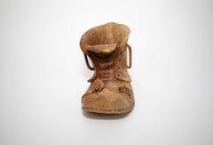 Bota de madera tallada con ratón