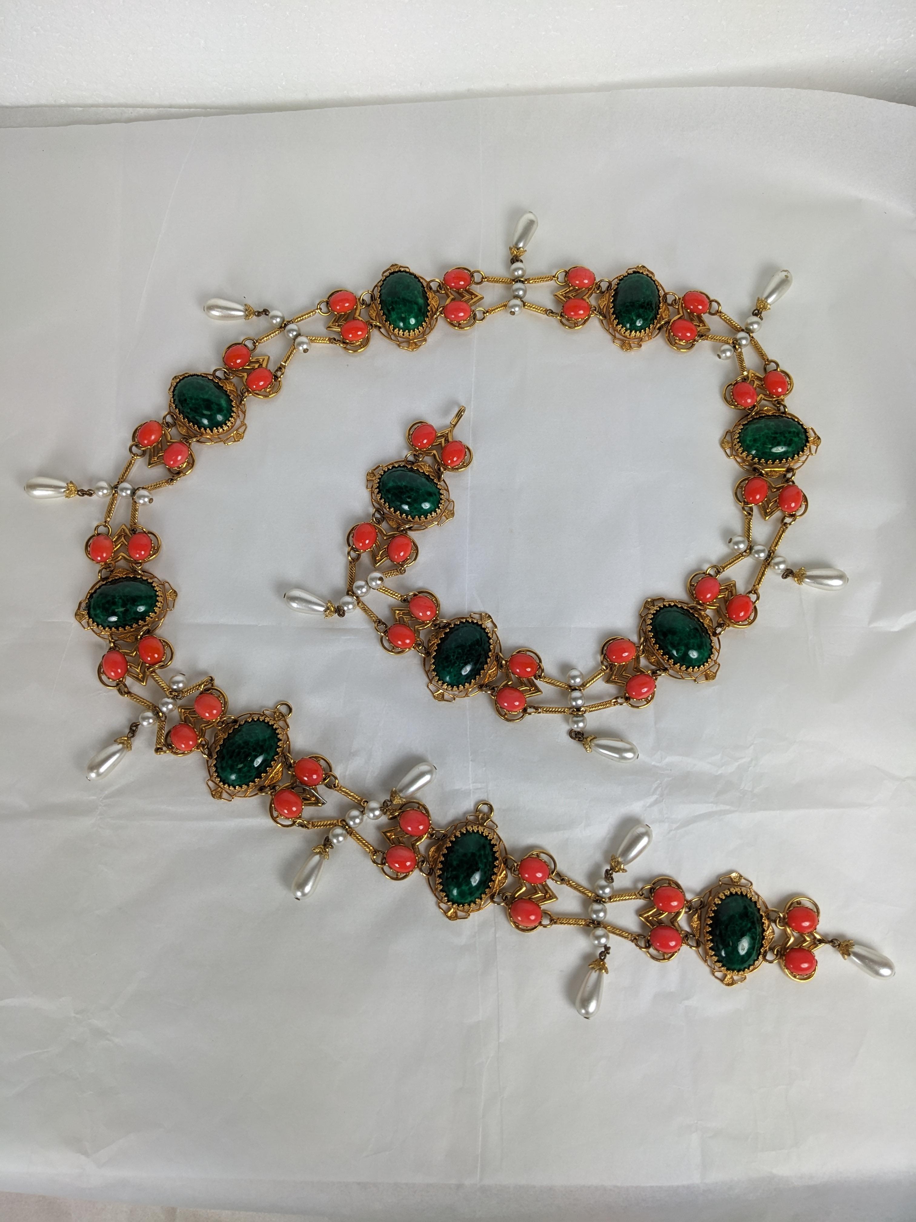Bohemian Robert of NY Jeweled Faux Coral and Jade Belt from the 1960's. Exotic 1960's inspiration with faux cab coral, jade and pearls set into gilt filigree frames. Adjustable hook closure 1960's USA. 