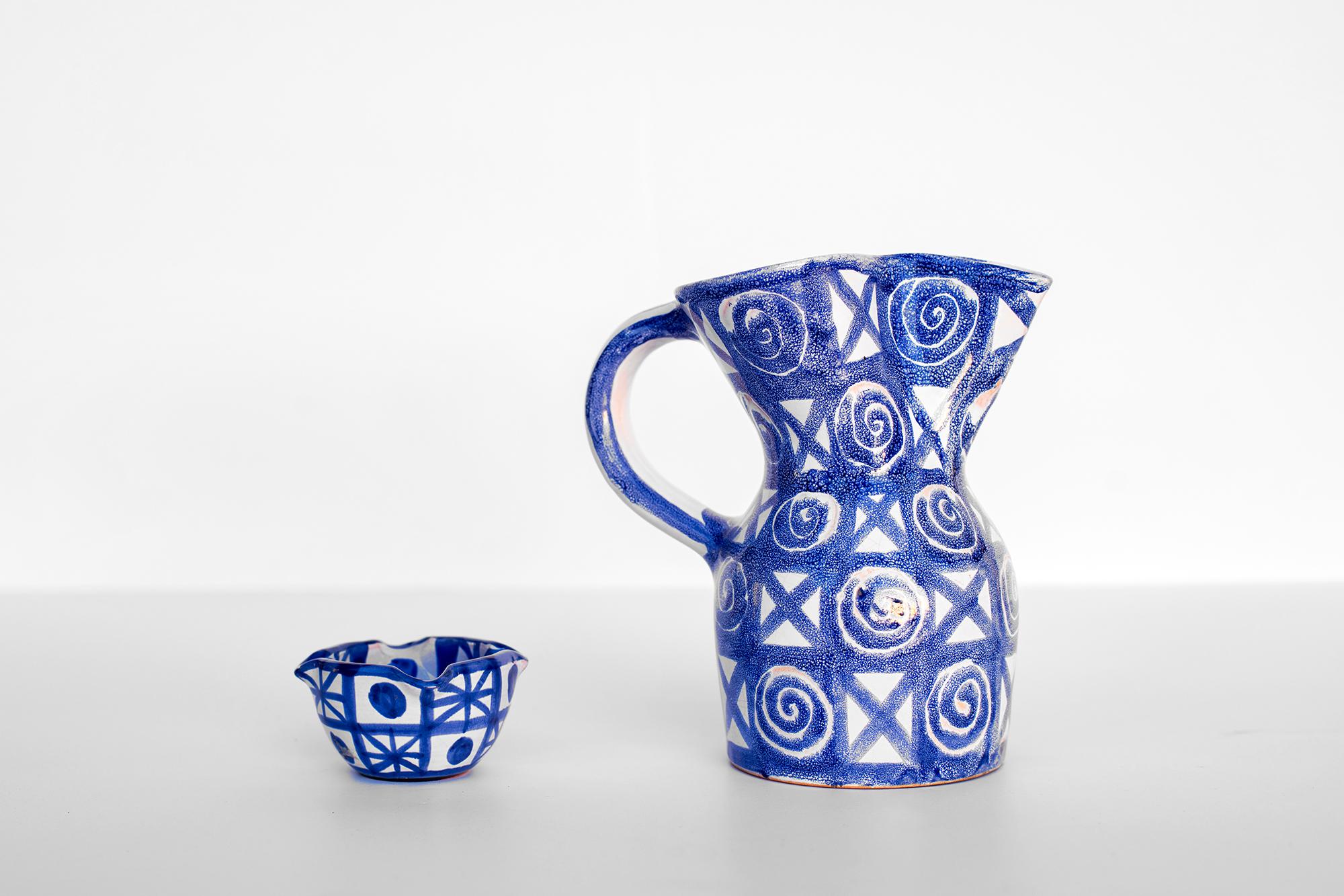 Ceramic pitcher and matching cup by Robert Picault, Vallauris
circa 1950
Rare blue pattern.