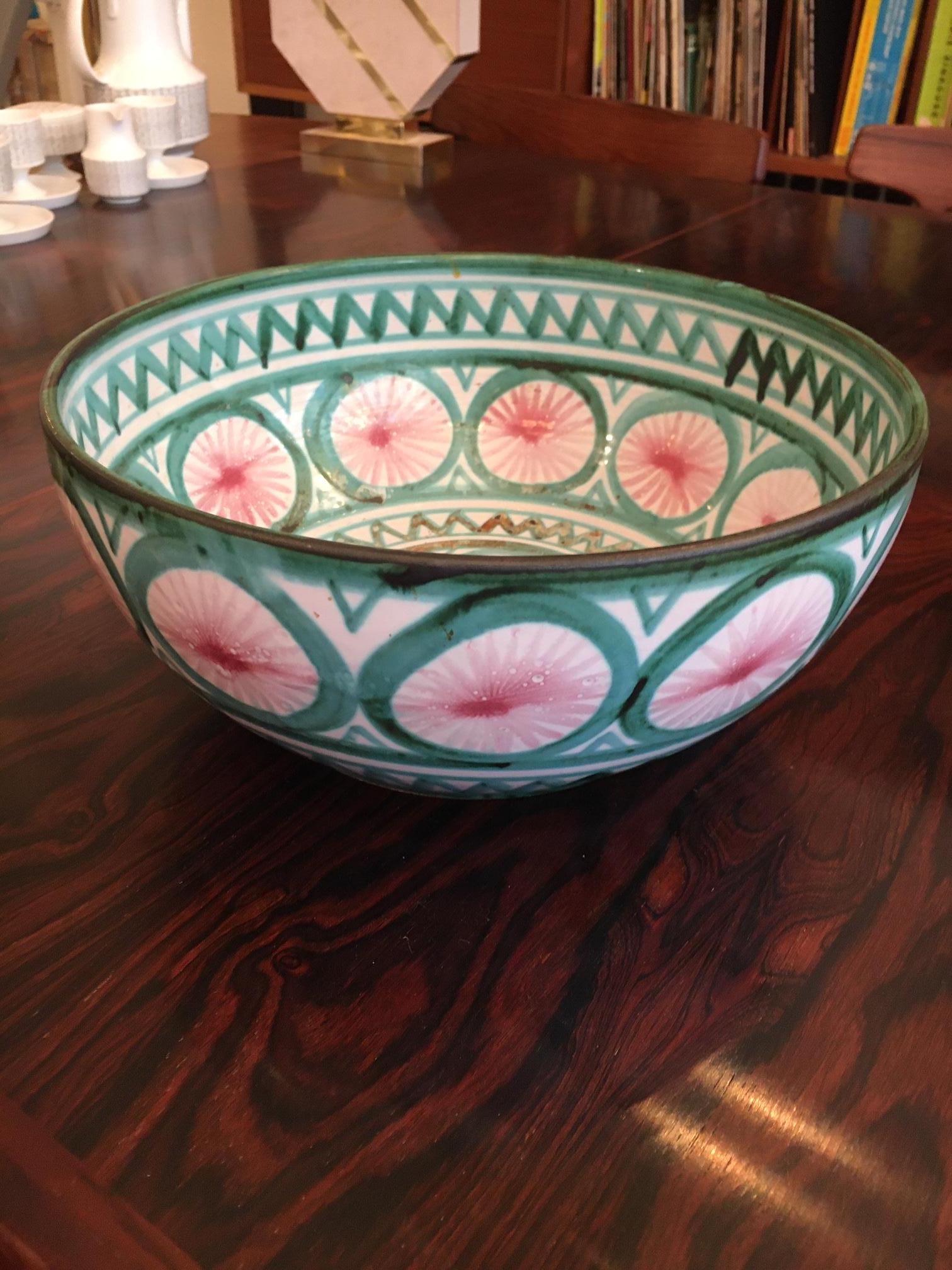 Large hand painted glazed ceramic bowl by Robert Picault made in Vallauris, France, ca. 1950s.
Robert Picault was one of the ceramists working in Vallauris during the 50's along with various artists and the most well known Pablo Picasso.
This large
