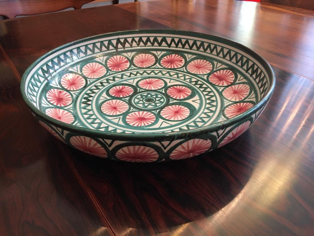 Large hand painted glazed ceramic dish by Robert Picault made in Vallauris, France, ca. 1950s
Robert Picault was one of the ceramists working in Vallauris during the 50's along with various artists and the most well known Pablo Picasso.
This large