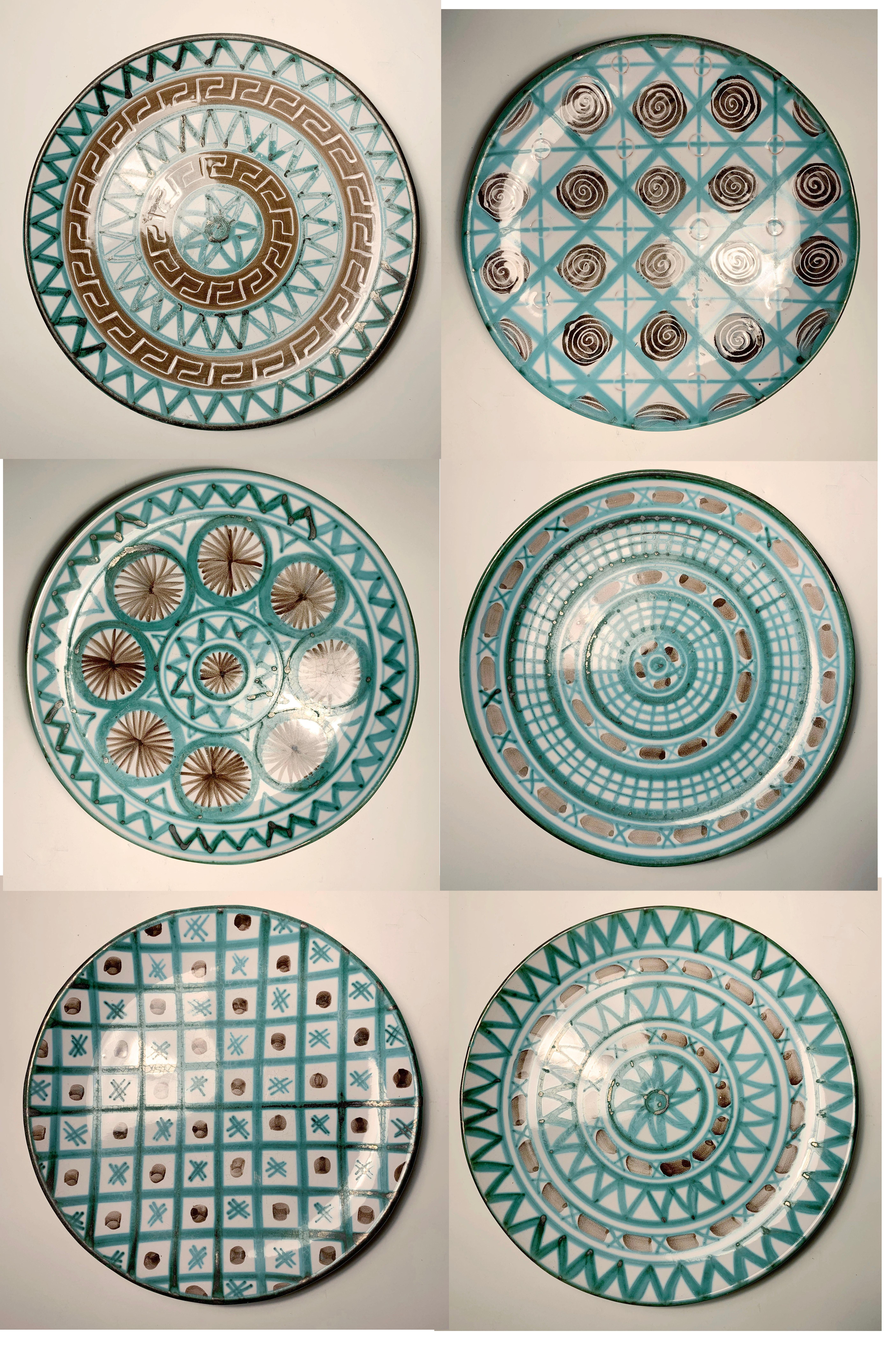 Robert Picault set of set of 6 round dinner plates.

Including an additional 7th plate that has a hairline on edge as shown.
first plate has some general ware to the glaze finish I think. As shown.