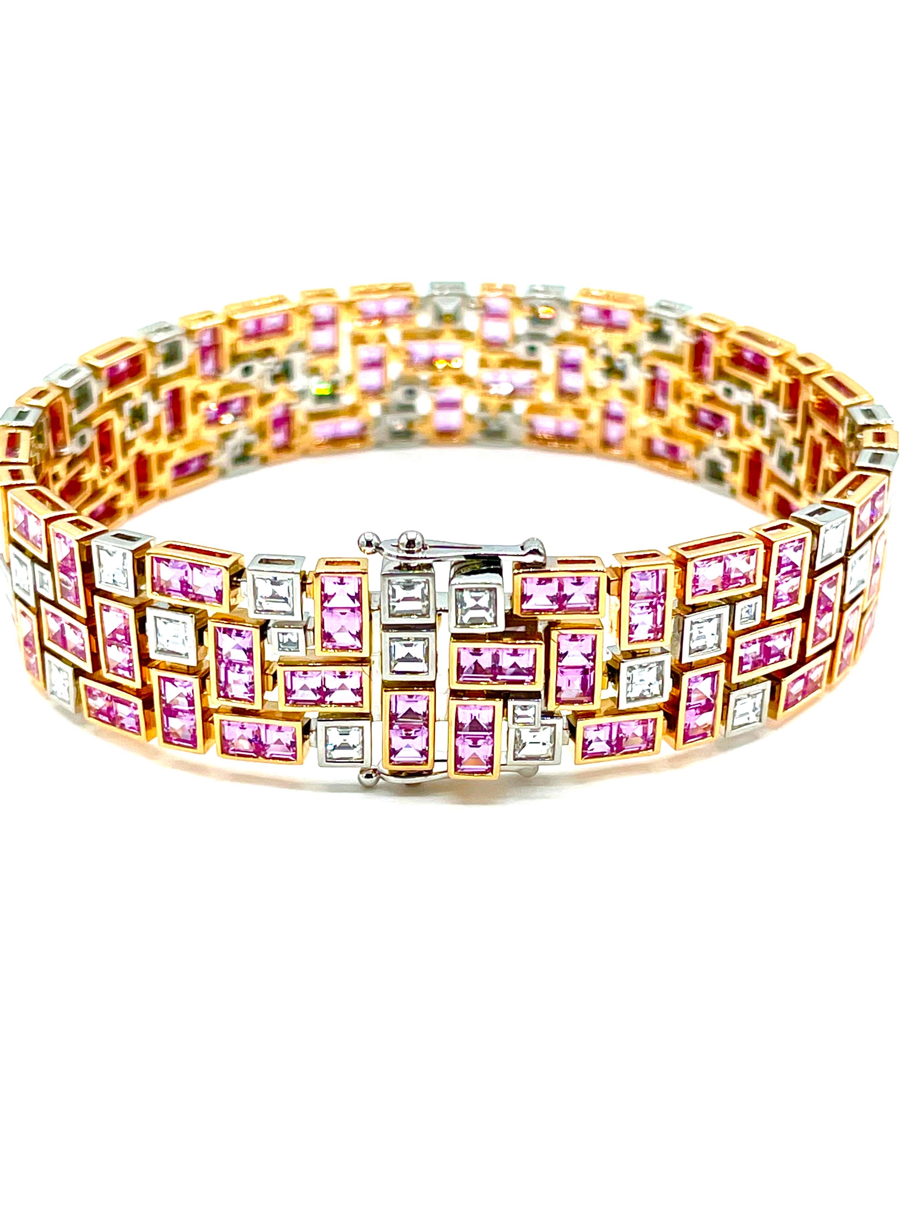 An amazing handcrafted work of art!  This Masterpiece bracelet, designed by Robert Procop, features 146 square cut pink Sapphires, set in 18K rose gold, with a total weight of 13.97 carats.  The Sapphires are off set with square cut Diamonds set in