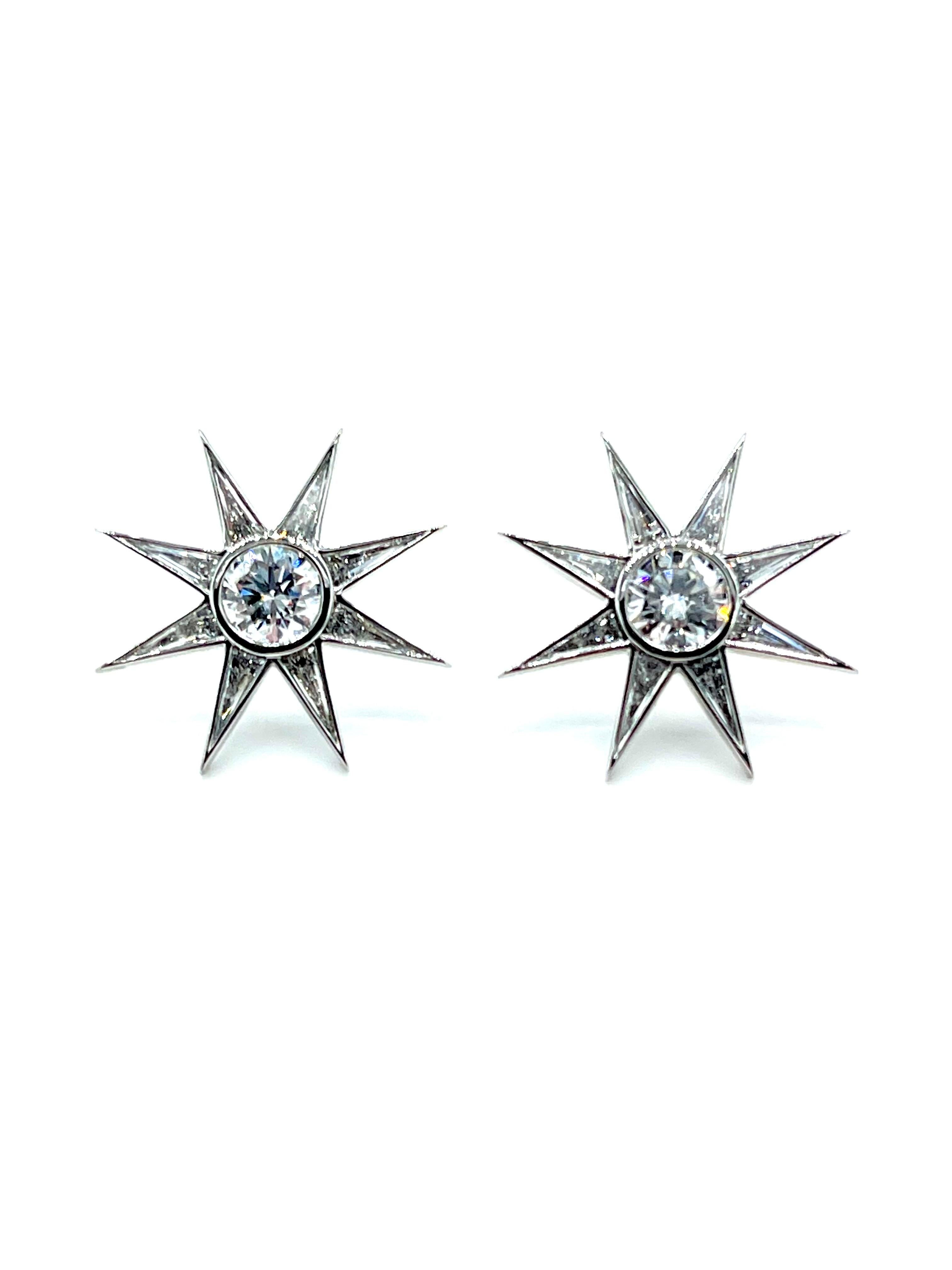 A beautiful pair of Diamond earring by designer Robert Procop!  The earrings feature a center round brilliant cut Diamond, surrounded by eight triangular cut Diamonds for a total weight of 1.57 carats.  The earrings are made in platinum, and have a