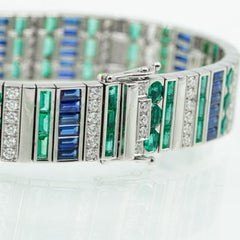 Robert Procop, bracelet en platine avec émeraudes (7,13 carats), saphirs (6,82 carats) et diamants