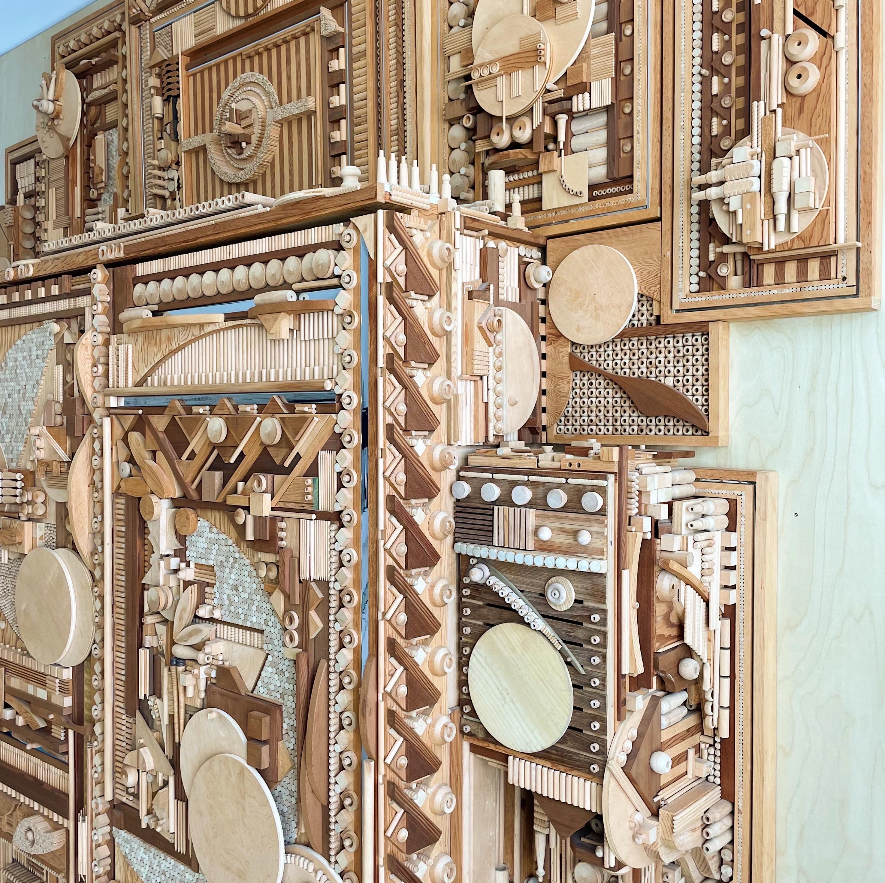 One of a kind monumental cabinet, purchased directly from the client Mr Salleroli (1933-) custom made it for. Made from thousands of pieces of wood found objects and dowels, some antique and vintage at the time of construction. The two center doors