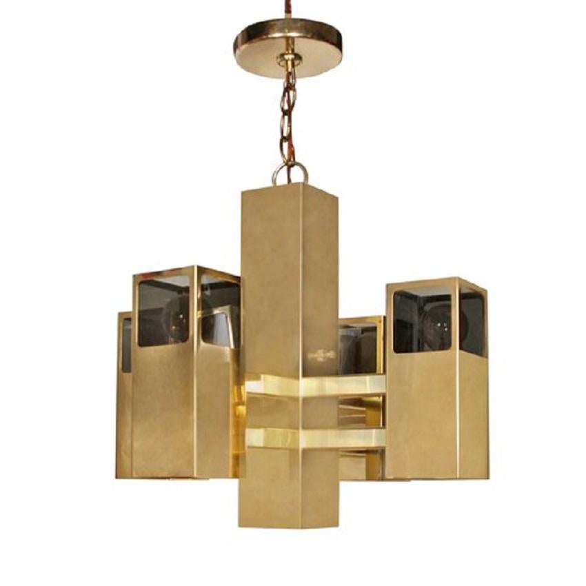 Robert Sonneman polished brass light fixture with four arms.

Includes hanging chain and canopy. 