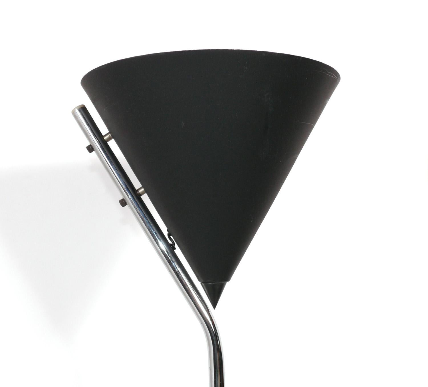 Sculptural Black and Chrome Floor Lamp, designed by Robert Sonneman, American, circa 1970s. It has been rewired and is ready to use.