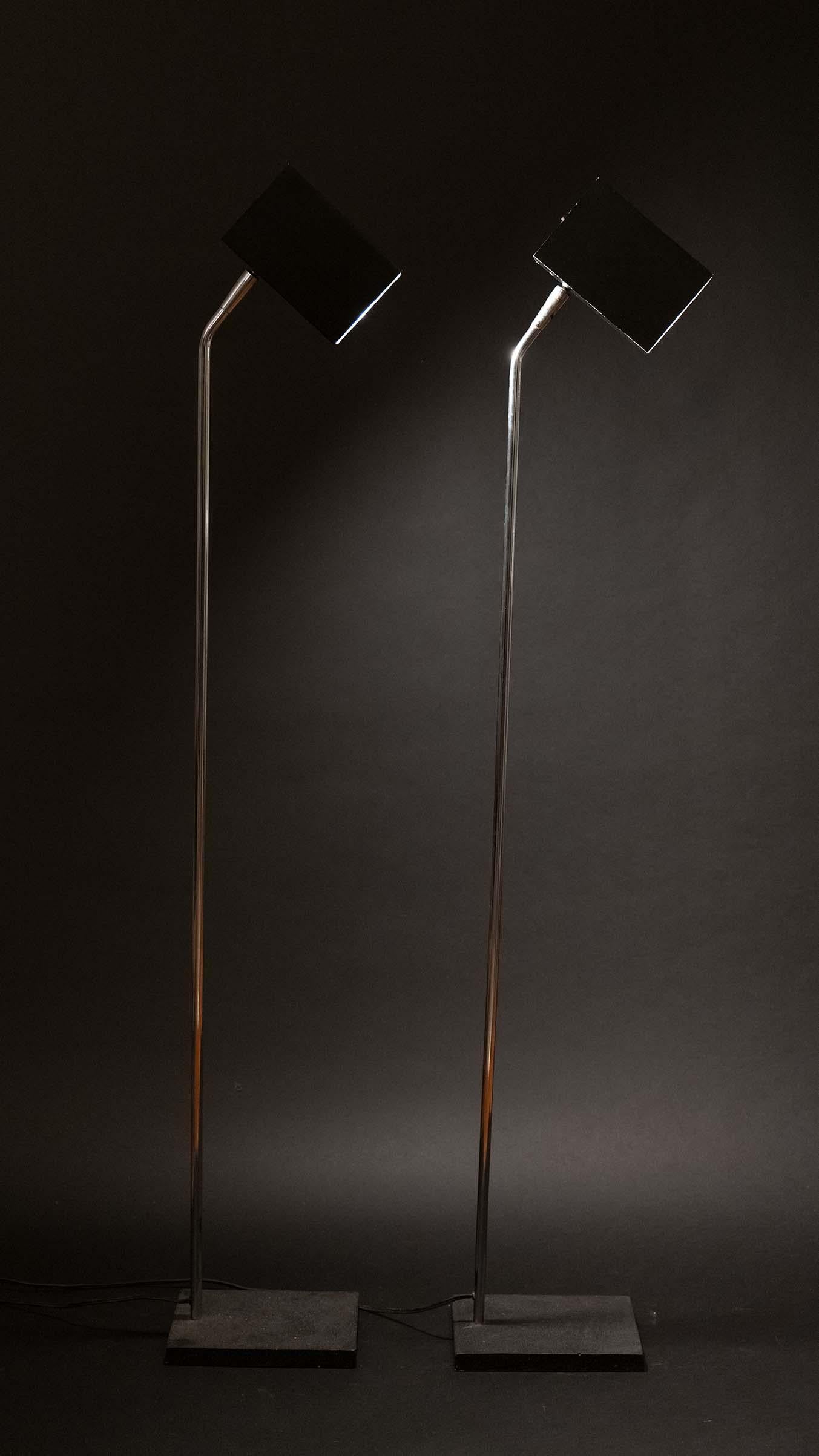 Cubist form, designed by Robert Sonneman for George Kovacs (labeled)

These floor lamps are a geometric and sleek addition to any space, each box head can be rotated and adjusted in many directions. Heavy bases provide strong support. 

Available as