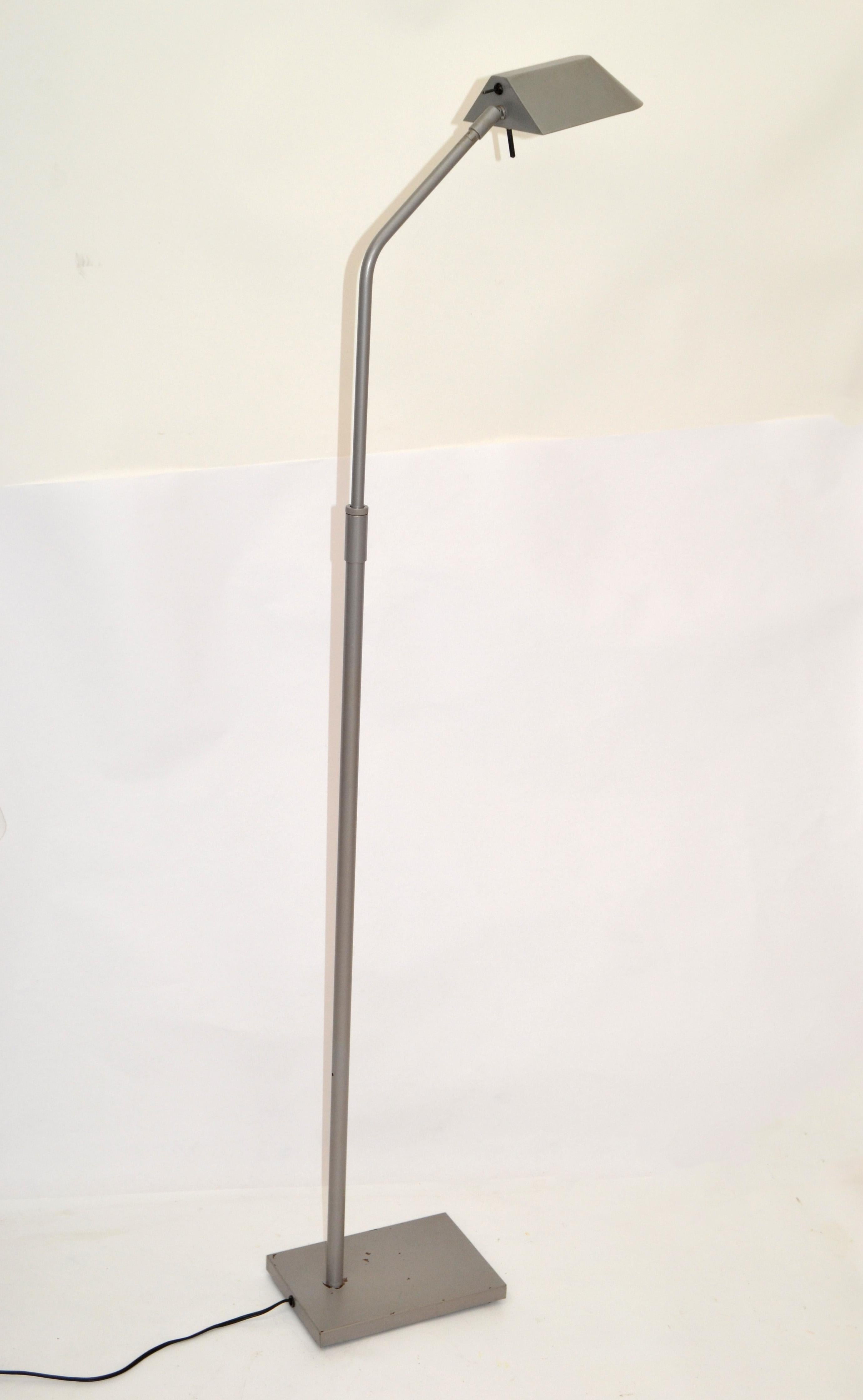 Elegant adjustable Steel floor lamp in Silver Finish from the 1987 designed by Robert Sonneman and made by George Kovacs Lighting.
Uses a Halogen bulb with max. 40 watts.
Comes with a footswitch and is in perfect working condition.
Makers Mark at